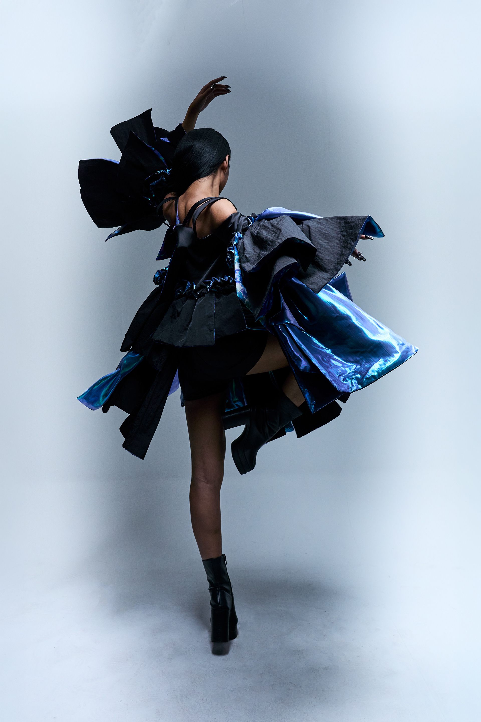 Raison d’être — Chromatic Ripple  Color in motion, form in transition.  A fashion editorial exploring fluid movement and tonal expression through layered color and silhouette. Shot in Bangkok for a Raffles International College mini collection.