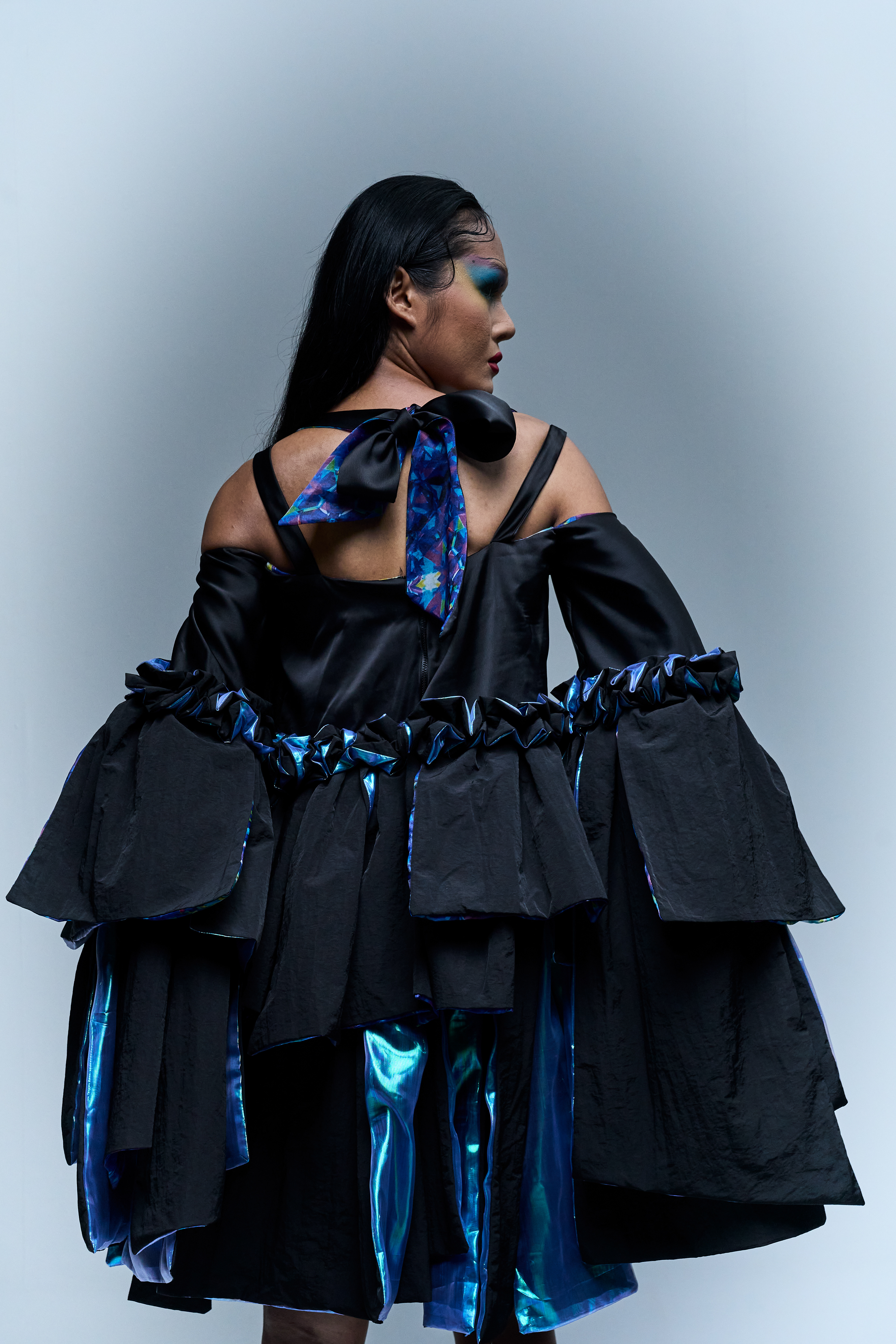 Raison d’être — Chromatic Ripple  Color in motion, form in transition.  A fashion editorial exploring fluid movement and tonal expression through layered color and silhouette. Shot in Bangkok for a Raffles International College mini collection.