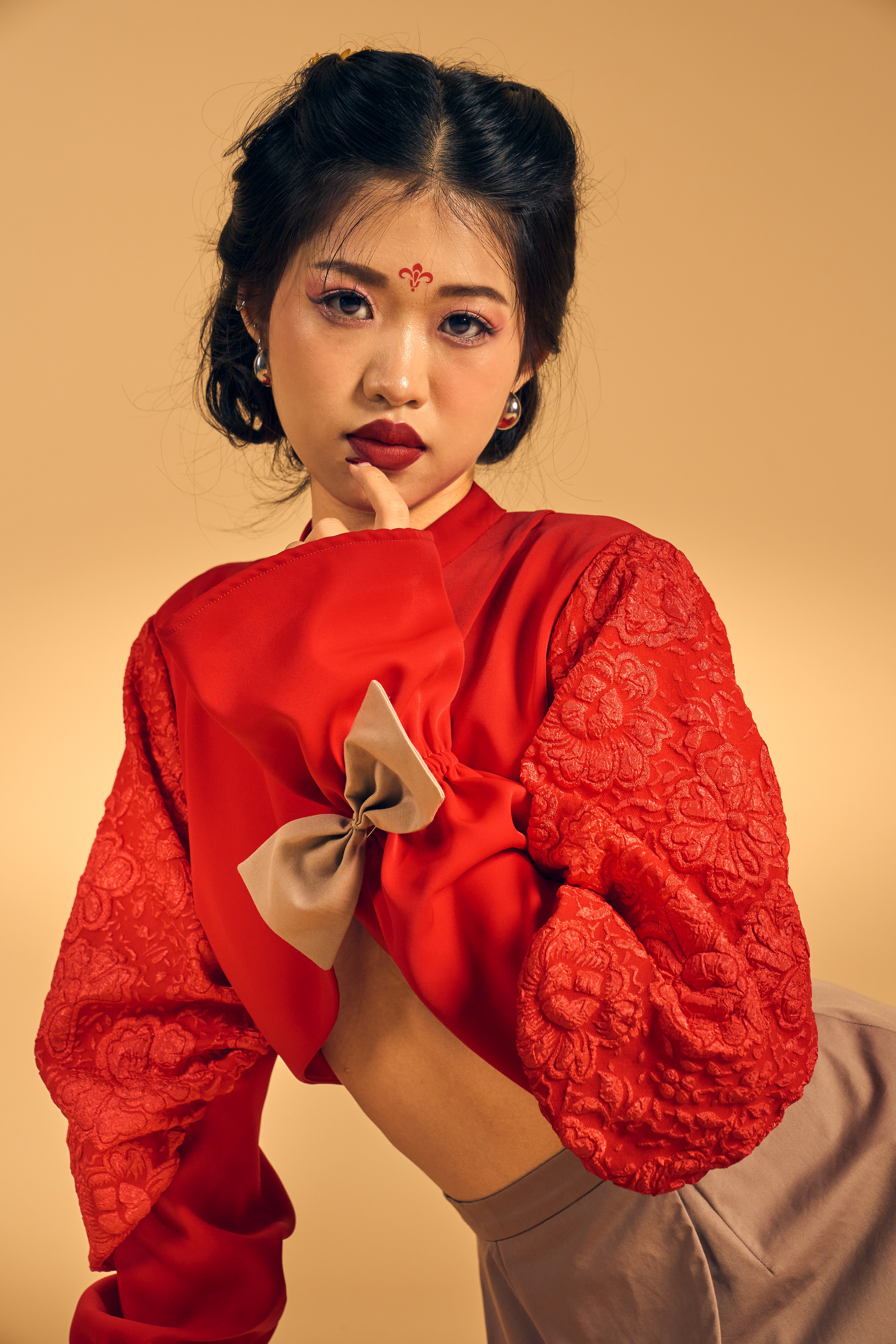 Silent Bloom A quiet harmony of modern femininity and cultural elegance. Soft silhouettes and blossoming forms express a beauty that grows with grace, not noise.  Shot in Bangkok for Elin, a Raffles International College student mini collection.