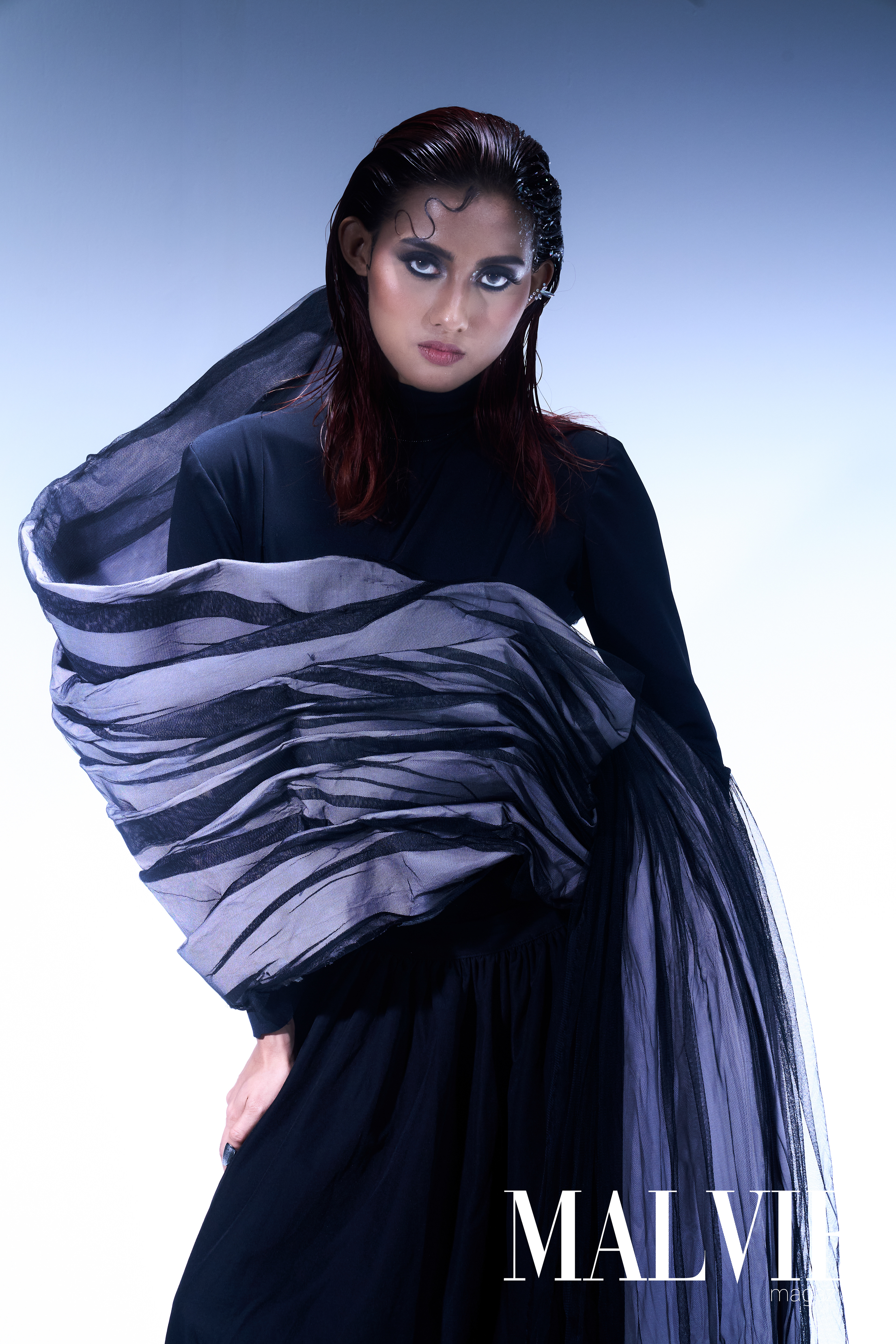 Movement as identity, silence as rhythm.  Inspired by Zat Pwe, a traditional Burmese performance art blending dance, music, and theatre. This editorial explores fluid motion and cultural expression through form and fabric. Shot in Bangkok for a Rangsit University fashion thesis collection, later selected for Malvie Magazine Issue 67.