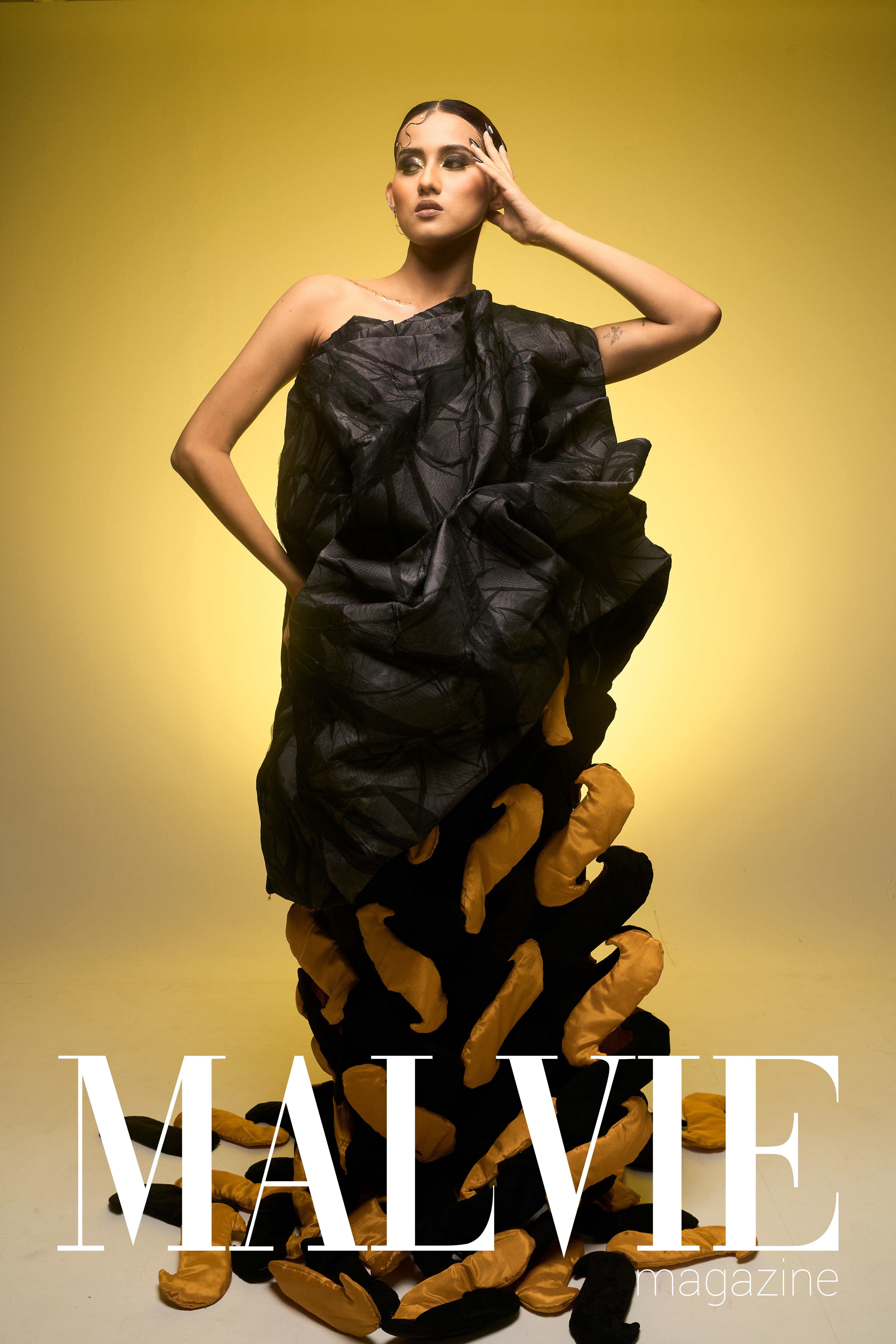 Movement as identity, silence as rhythm.  Inspired by Zat Pwe, a traditional Burmese performance art blending dance, music, and theatre. This editorial explores fluid motion and cultural expression through form and fabric. Shot in Bangkok for a Rangsit University fashion thesis collection, later selected for Malvie Magazine Issue 67.