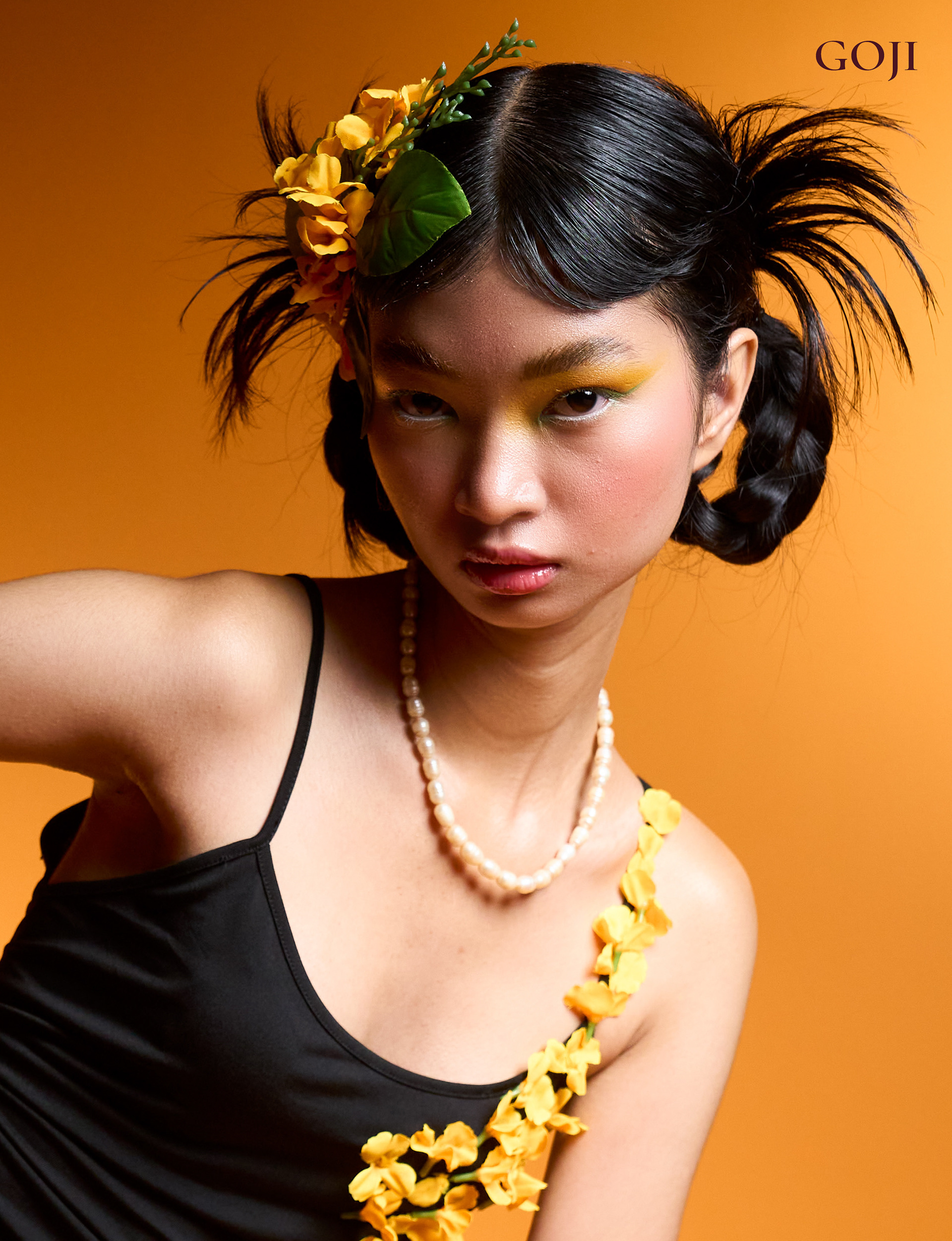Padauk - A contemporary interpretation of cultural identity inspired by the Myanmar New Year flower — symbolizing youth, love, and quiet strength.  Warm tones and controlled lighting shape a visual narrative of softness and power.  Selected for Goji Magazine – Signature Edition, Issue No. 167 (2026). Shot in Bangkok.