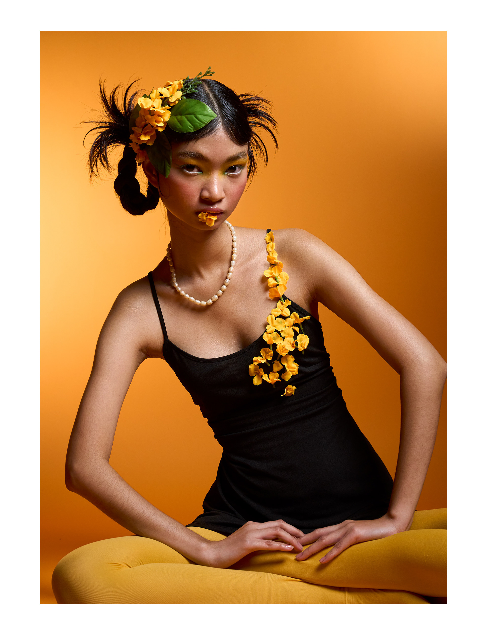 Padauk - A contemporary interpretation of cultural identity inspired by the Myanmar New Year flower — symbolizing youth, love, and quiet strength.  Warm tones and controlled lighting shape a visual narrative of softness and power.  Selected for Goji Magazine – Signature Edition, Issue No. 167 (2026). Shot in Bangkok.