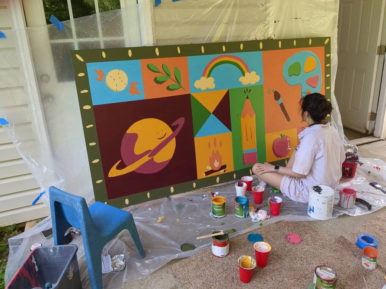 Deciding where to paint next.