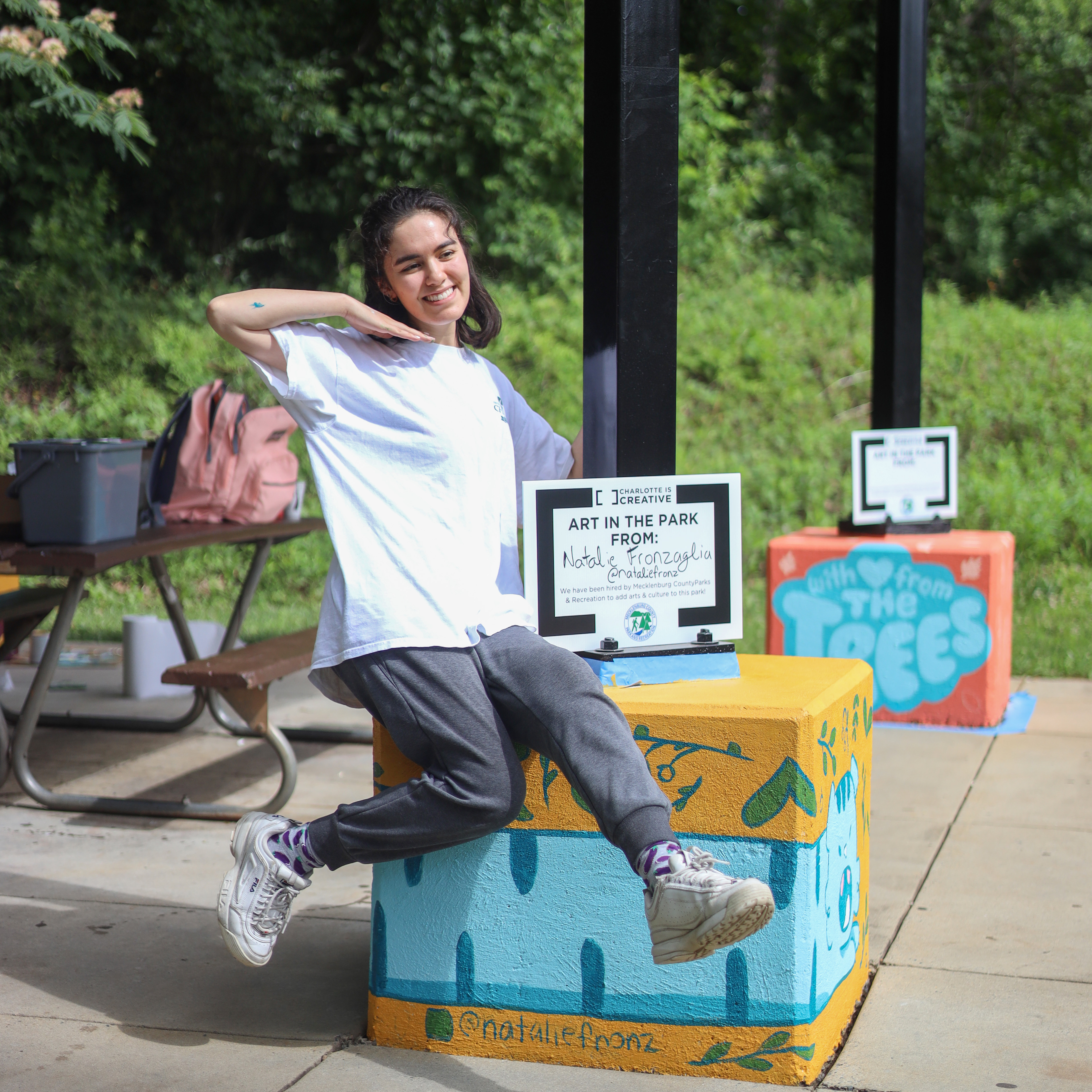 Posing with the Long Blue Tiger mural.