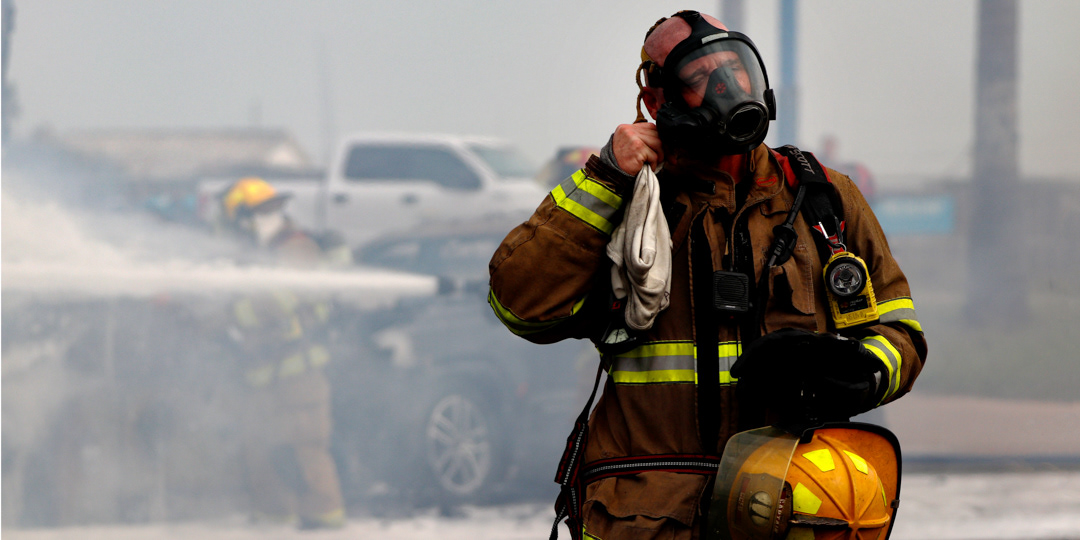 Firefighters respond to an RV on fire near Park Road 22 and Hwy 361 on Dec. 31, 2021.