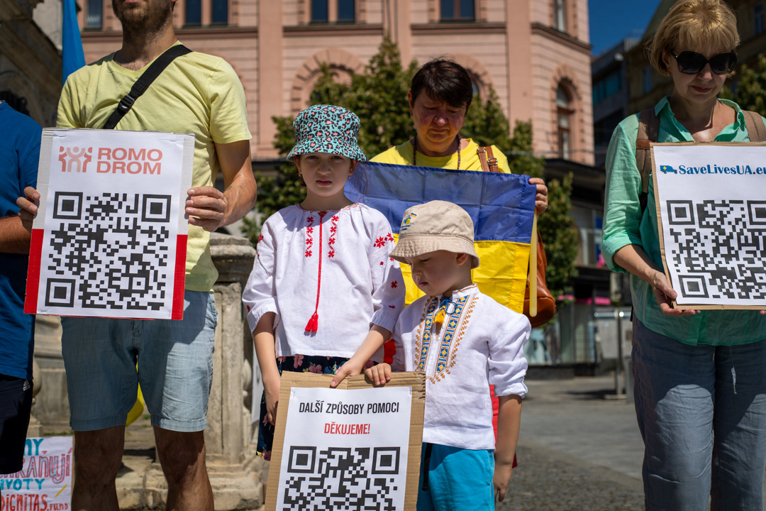 Two children stand with pro-Ukraine group Stand With Ukraine-Brno during a demonstration against Russia's war in Ukraine on Aug 13, 2023 at náměstí Svobody in Brno, Česká republika. The group has met every Sunday since the war began in February 2022. Blaine Young for AltoPress