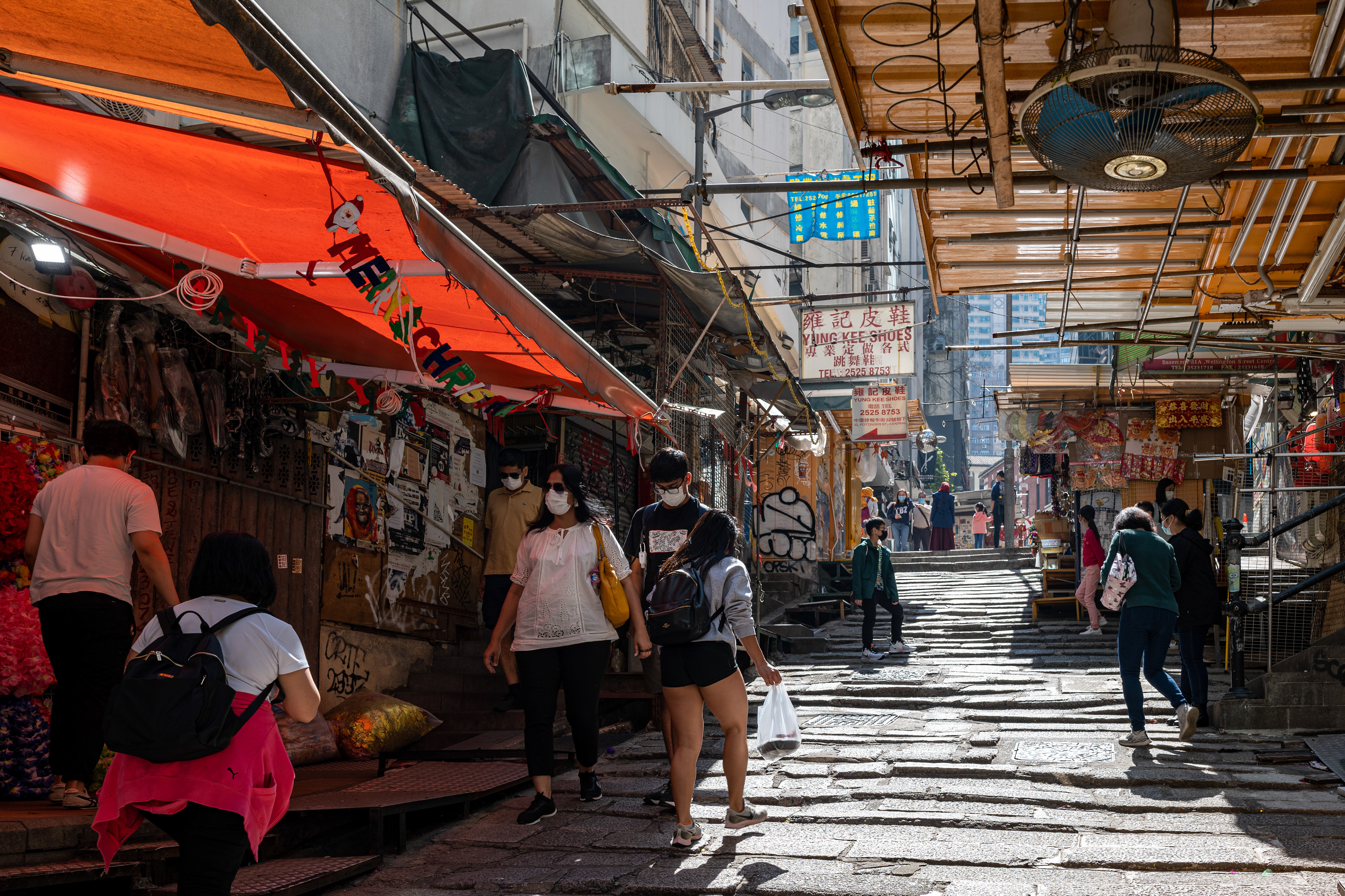 From wikipedia, "Pottinger Street is a street in Central, Hong Kong. It is also known as the Stone Slabs Street (Chinese: 石板街) since the street is paved unevenly by granite stone steps. It was named in 1858 after Henry Pottinger, the first Governor of Hong Kong, serving from 1843 to 1844.". [Panasonic LUMIX DC-S5, Sigma 35mm F/2 DG DN | Contemporary 020]