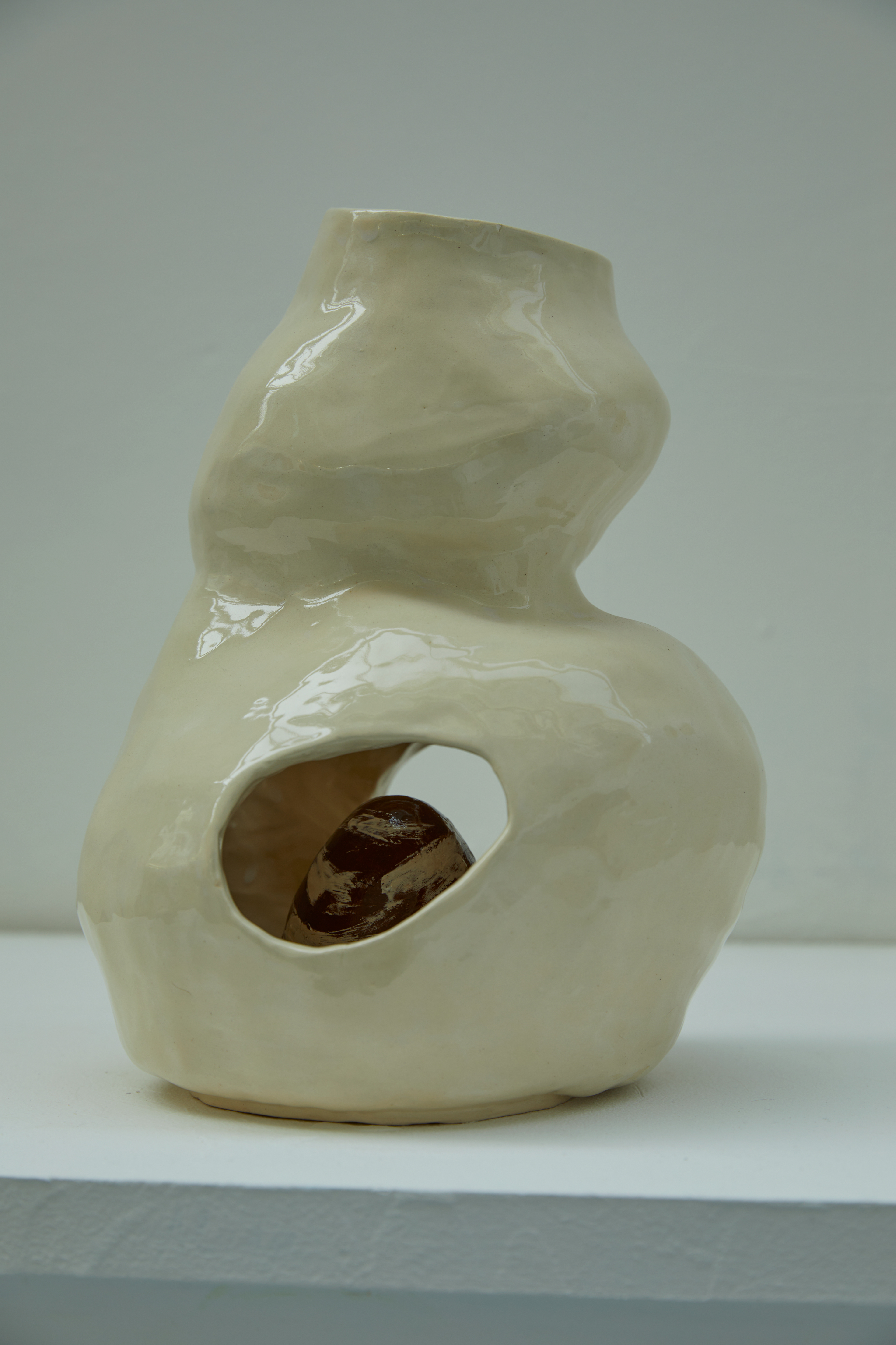 his anthropomorphic ceramic vase was inspired by feminine theorist Bracha Etting's concept of "Matrix". In a Matrixal way of thinking, we identify one another as "non-I", and are able to accept each other without having to abolish the difference. This psychological dynamic can be found during the pre-natal phase, mother and fetus are co-existing, cherishing each other without even knowing each other. I celebrate this duality, critical consciousness, and responsible relationship with others and the world.