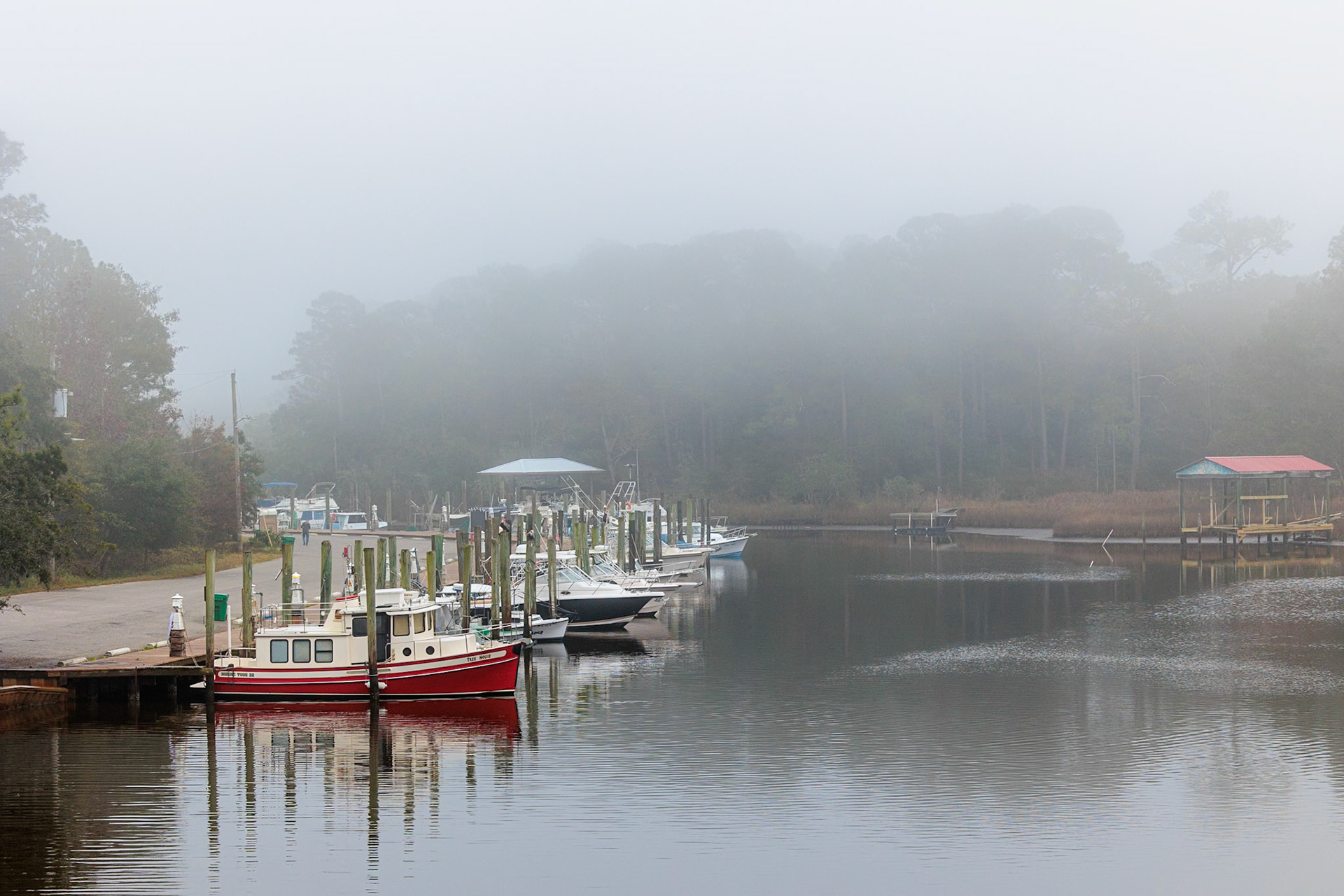 211231_013 Private fishing boats in the harbor at Ocean Springs, Mississippi on a foggy morning