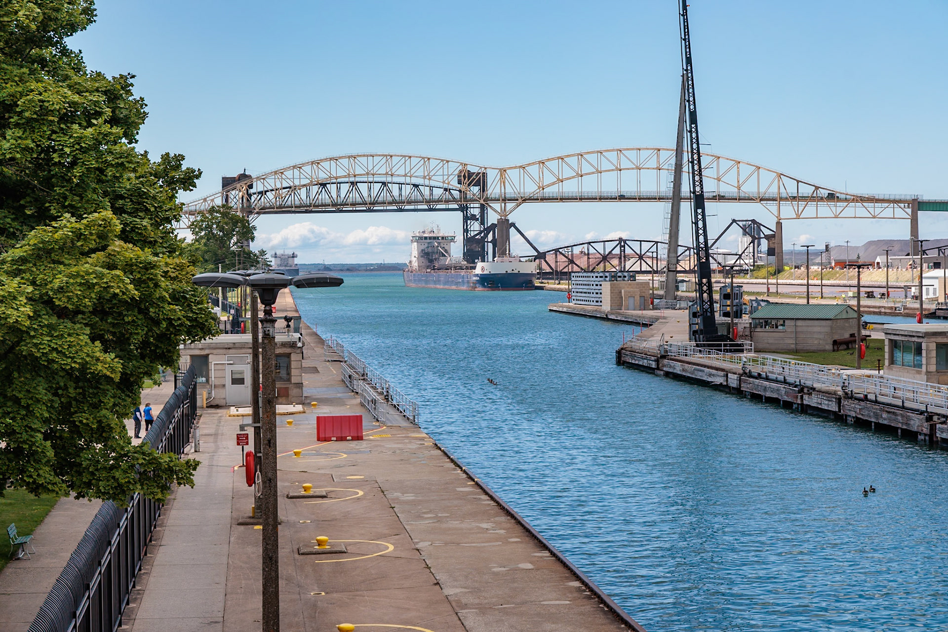 250820_068 Cargo ship entering the Soo Locks on the St. Marys River connecting Lake Superior and Lake Huron with a 21 foot elevation change.