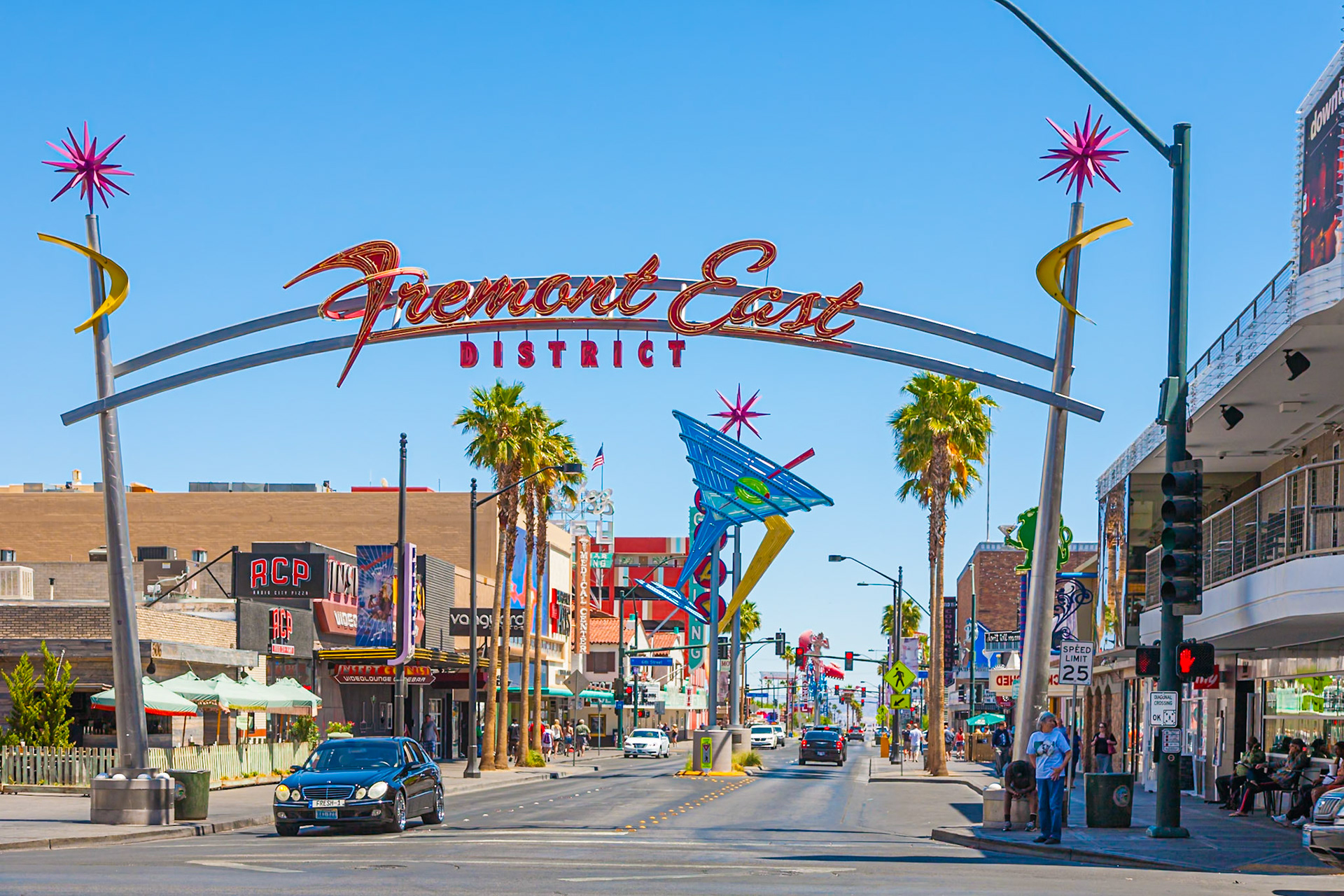 140501_569 Neon "Fremont East District" sign on arch over Fremont Street in downtown Las Vegas, Nevada
