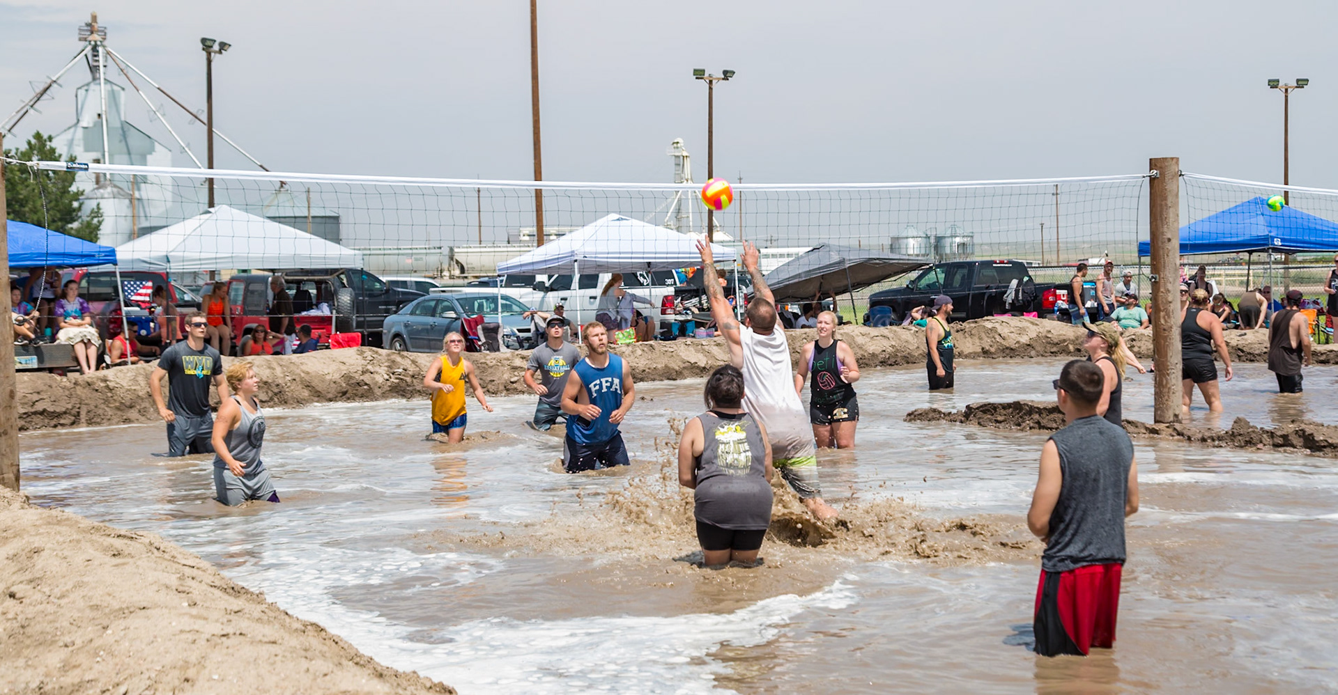 180805_028 "Fun in the Mud" is an annual volleyball tournament played in mud bogs in the town of Pine Bluffs, Wyoming
