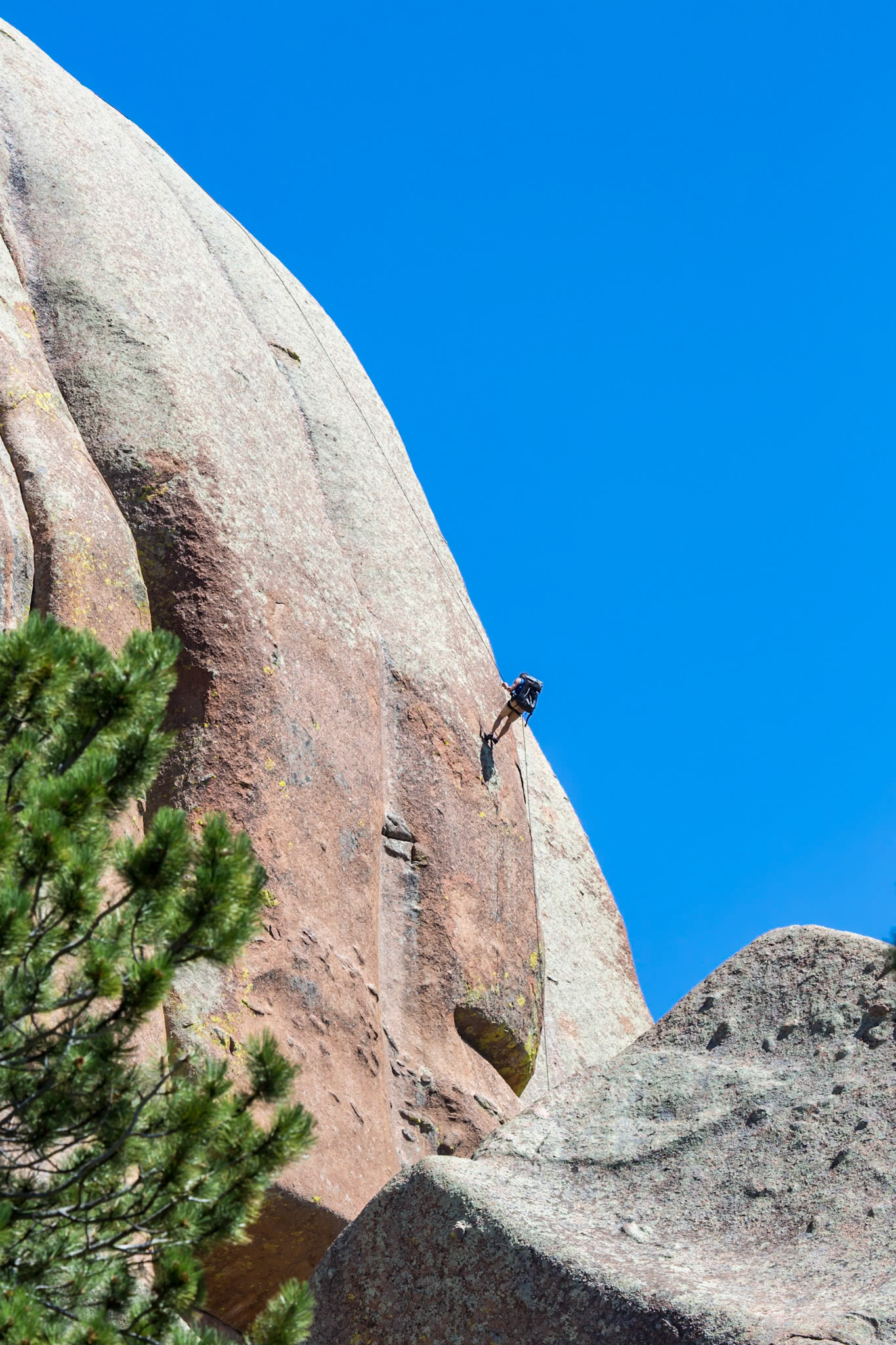 180811_051 Man rock climbing in the Vedauwoo Recreation Area of Medicine Bow National Forest in Wyoming