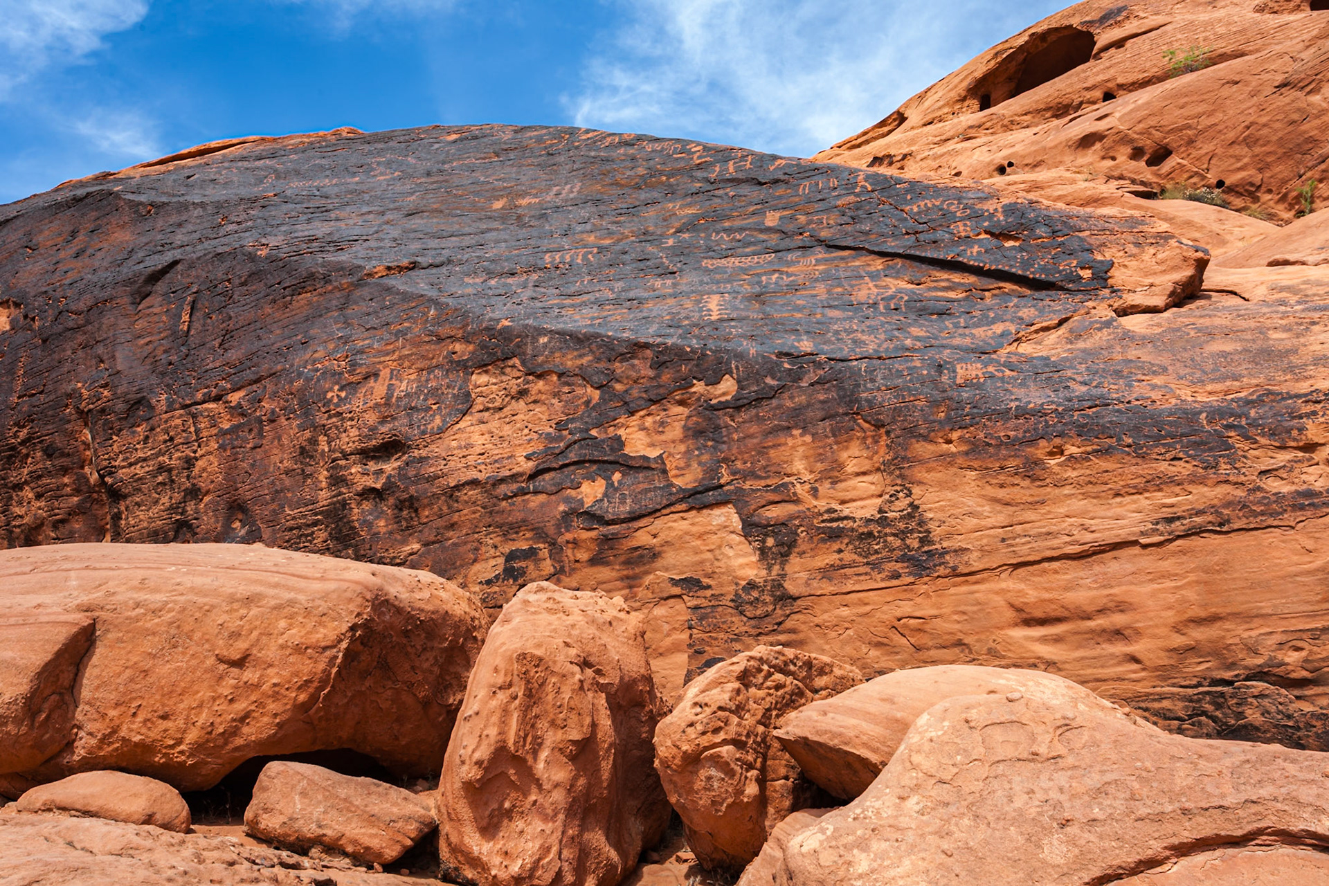 140503_098 Symbols etched in red Aztec sandstone rock formations in the Valley of Fire State Park in Overton, Nevada northeast of Las Vegas