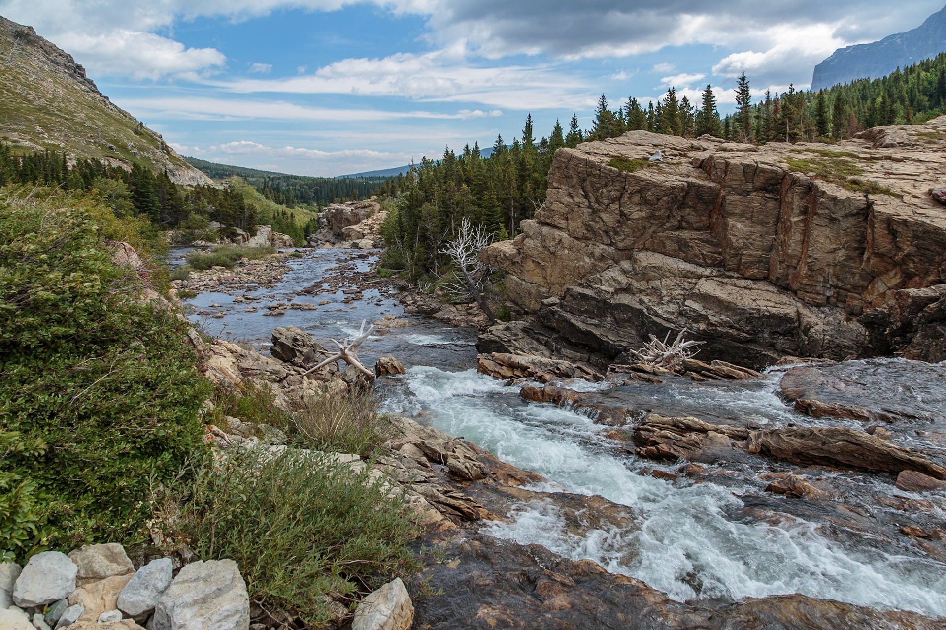 180828_025 Swiftcurrent Creek flowing through rocky terrain in the Many Glacier area of Glacier National Park in Montana, USA