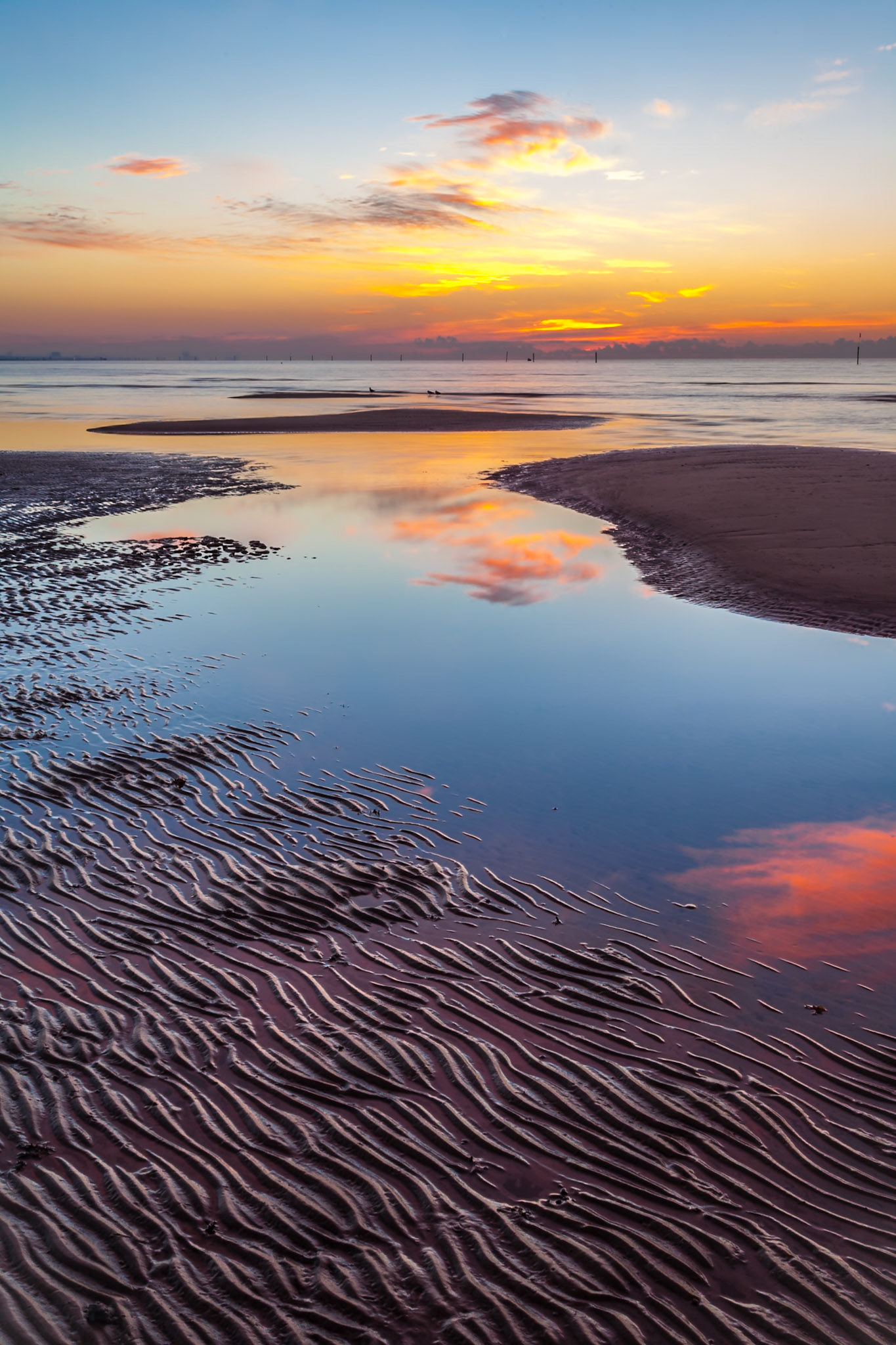 141009_020 Sunrise during a low tide on the beach at Gulfport, Mississippi