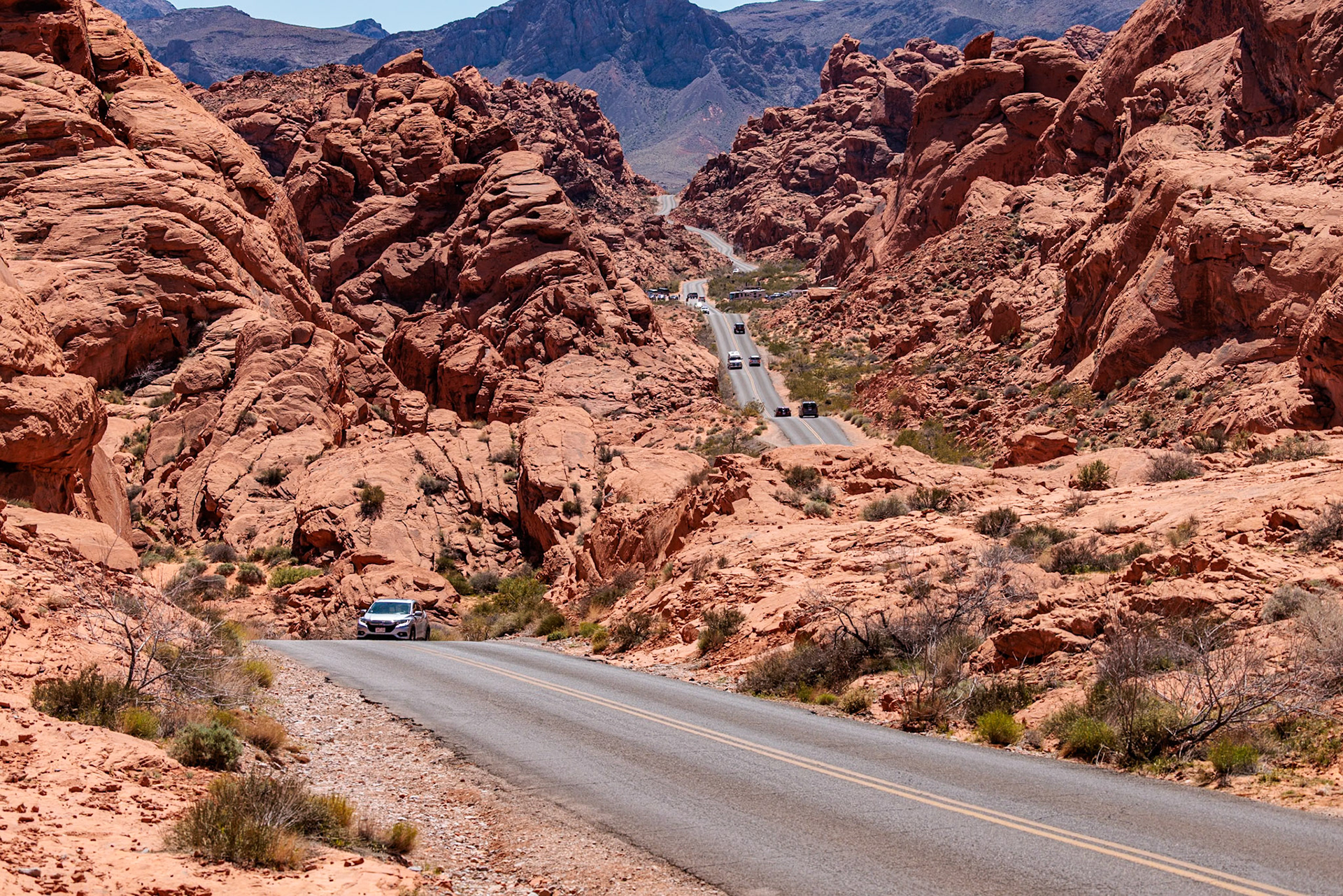 230330_271 Traffic on Mouse's Tank Road winds between the red sandstone rock formations in Valley of Fire State Park near Overton, Nevada