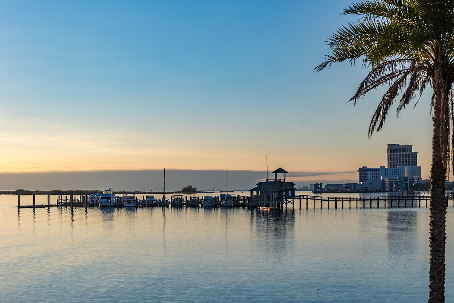 220107_010 Biloxi Schooner Pier Complex at sunset on the Gulf of Mexico at Biloxi, Mississippi, USA
