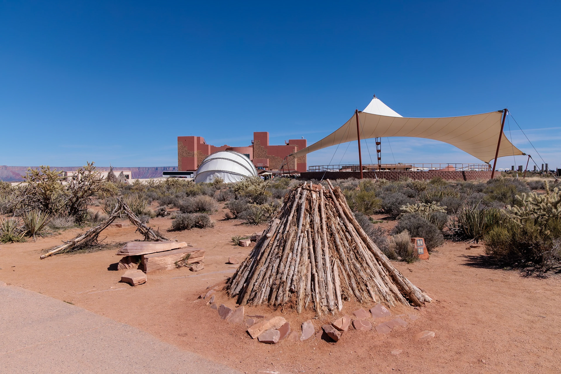 230405_128 Cultural exhibits and shade structures at the Eagle Point overlook area of Grand Canyon West near Peach Springs, Arizona