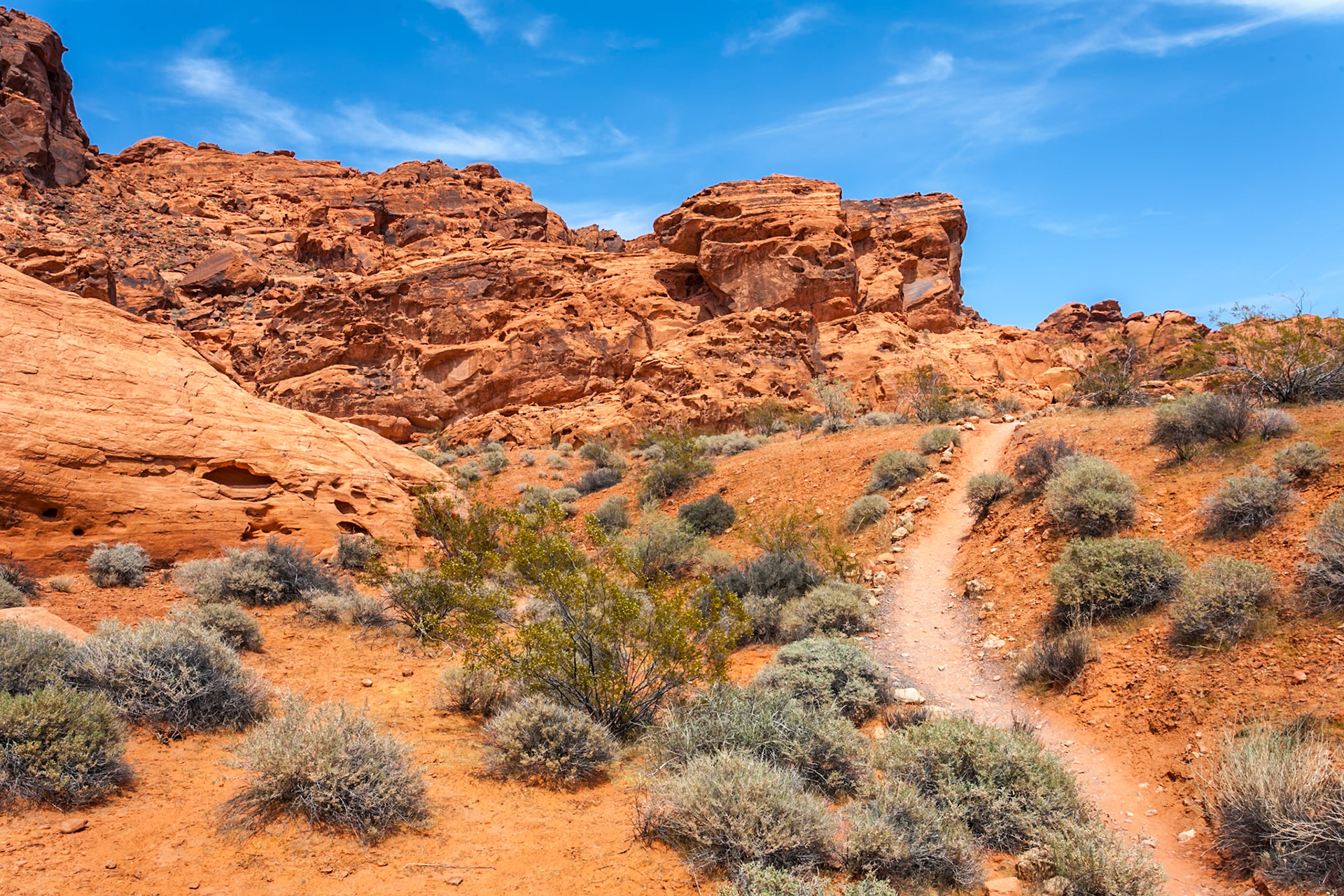 140503_065 Hiking trail winds through red Aztec sandstone rock formations in the Valley of Fire State Park in Overton, Nevada northeast of Las Vegas