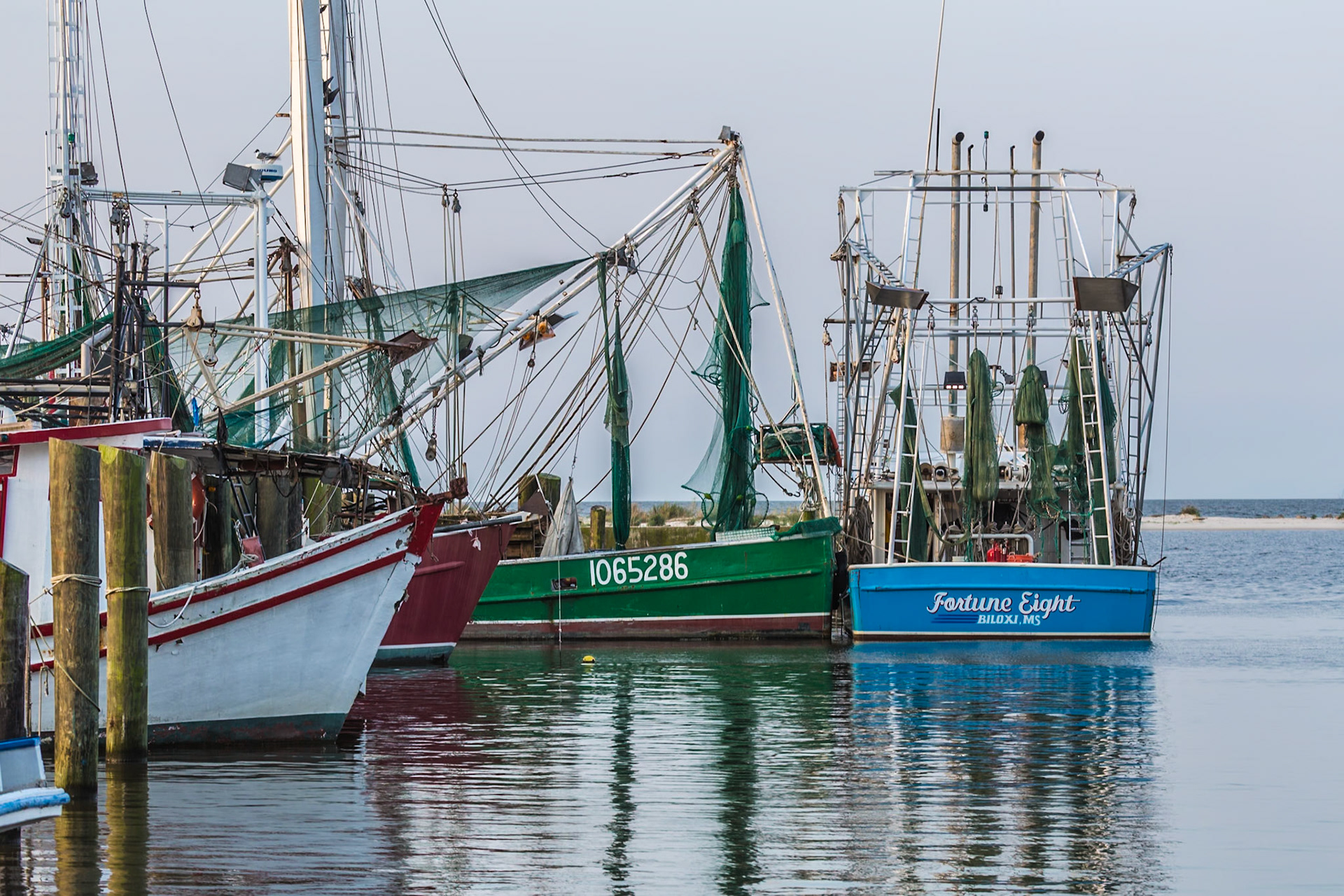 160429_025 Commercial shrimp boats moored near the beach in Biloxi, Mississippi, USA