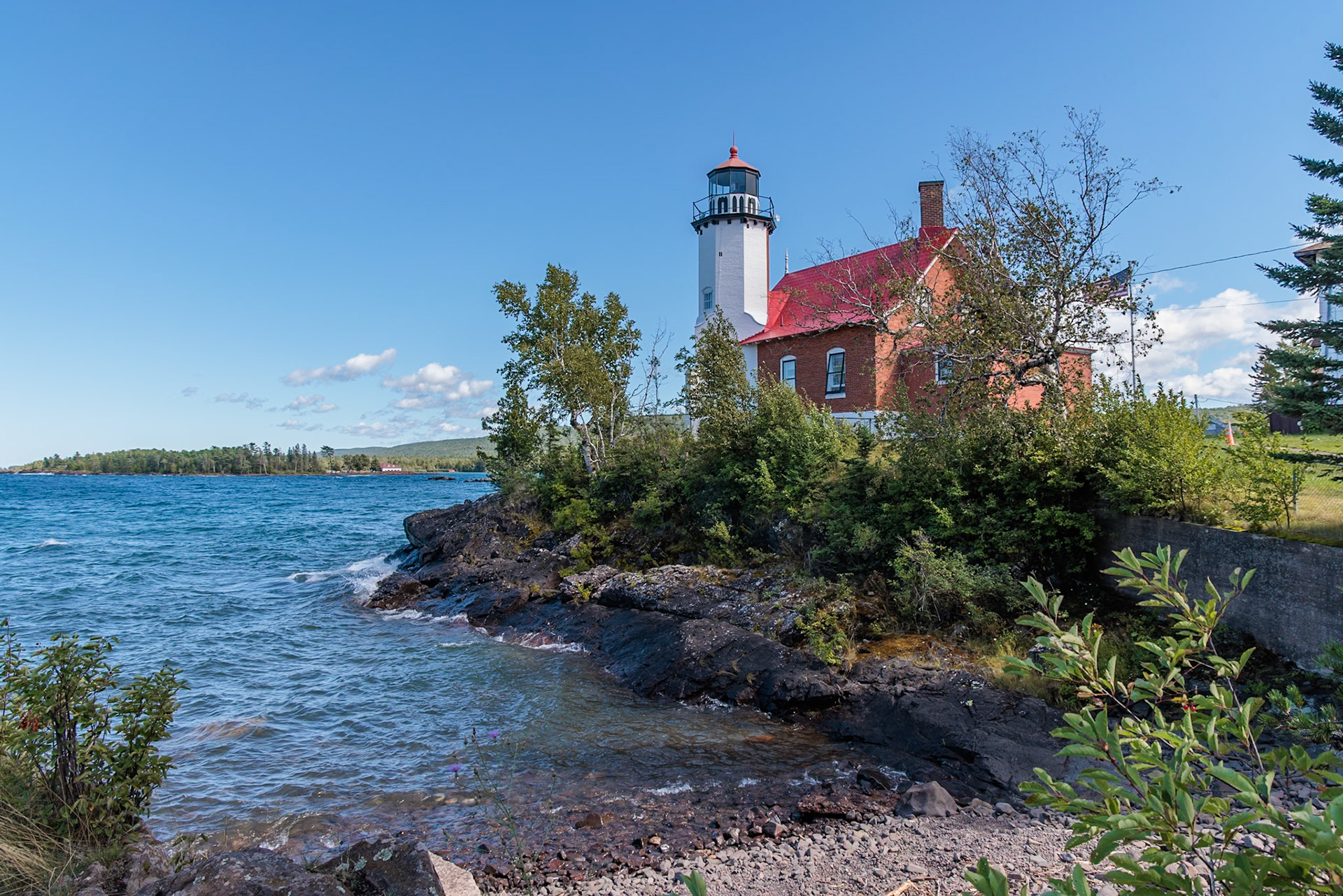 250823_124 Eagle Harbor Light Station on the rocky entrance to Eagle Harbor at Eagle Harbor, Michigan, USA