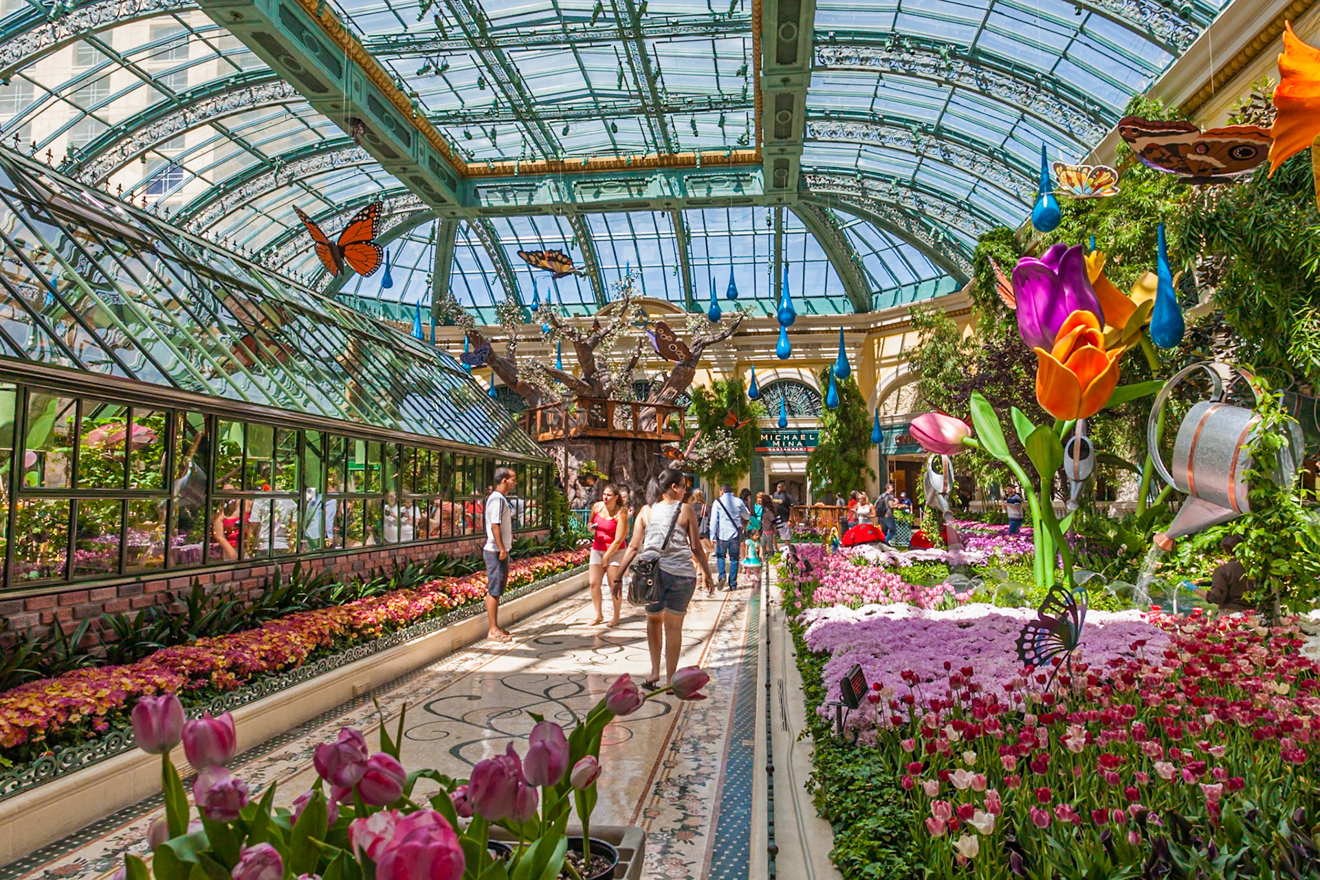 140502_601 Tourists visiting Bellagio's Conservatory &amp; Botanical Gardens in the Billagio Luxury Resort and Casino on the Las Vegas Strip in Paradise, Nevada