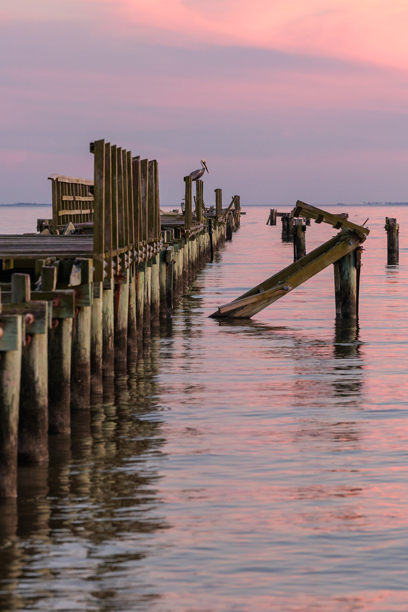220114_230 Dilapidated fishing pier damaged from hurricanes in Long Beach, Mississippi, USA