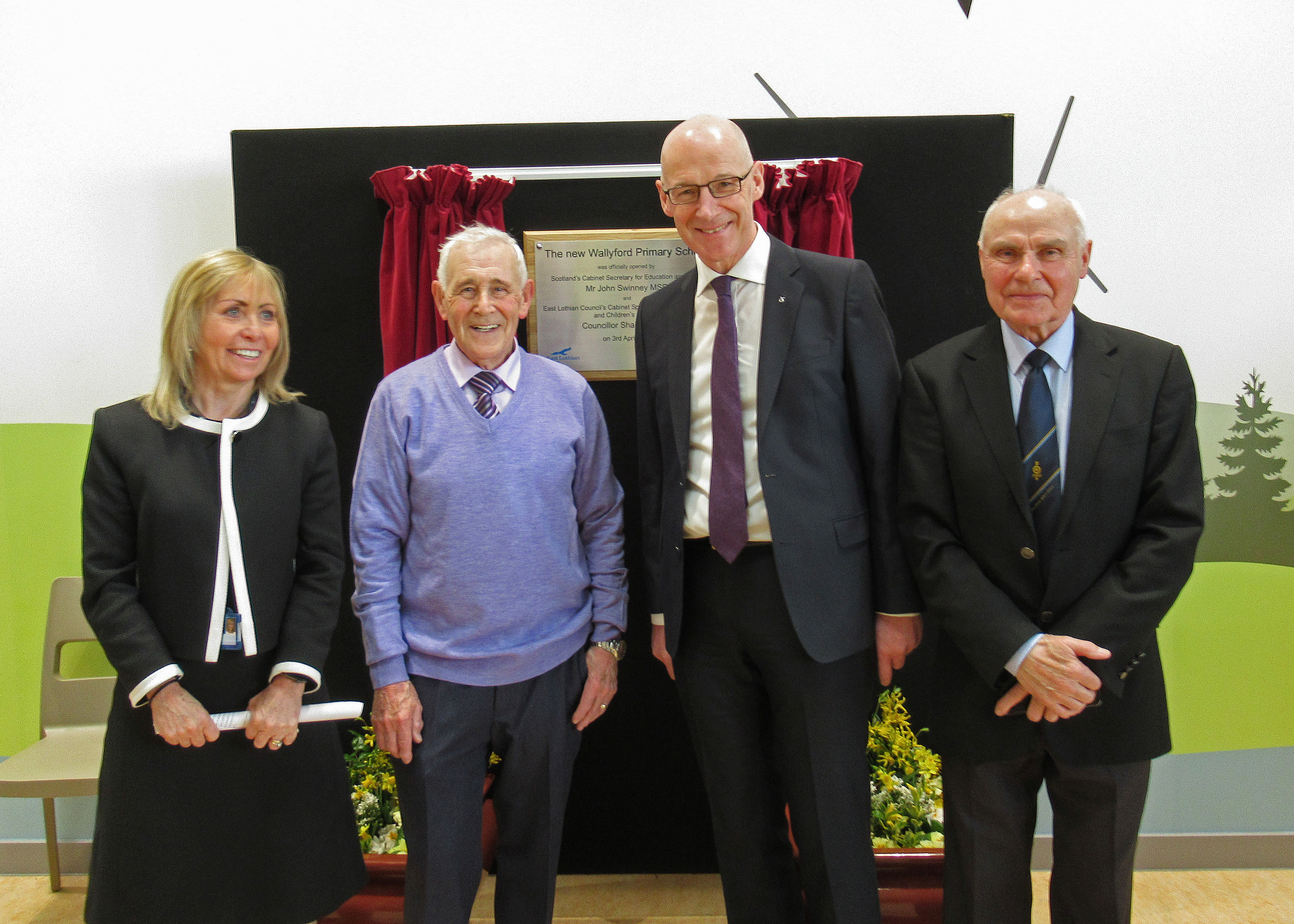 Angus with Angela Leitch (East Lothian Council), John Swinney (Education Secretary at the time), and Alister Hadden (Wallyford Community Council).