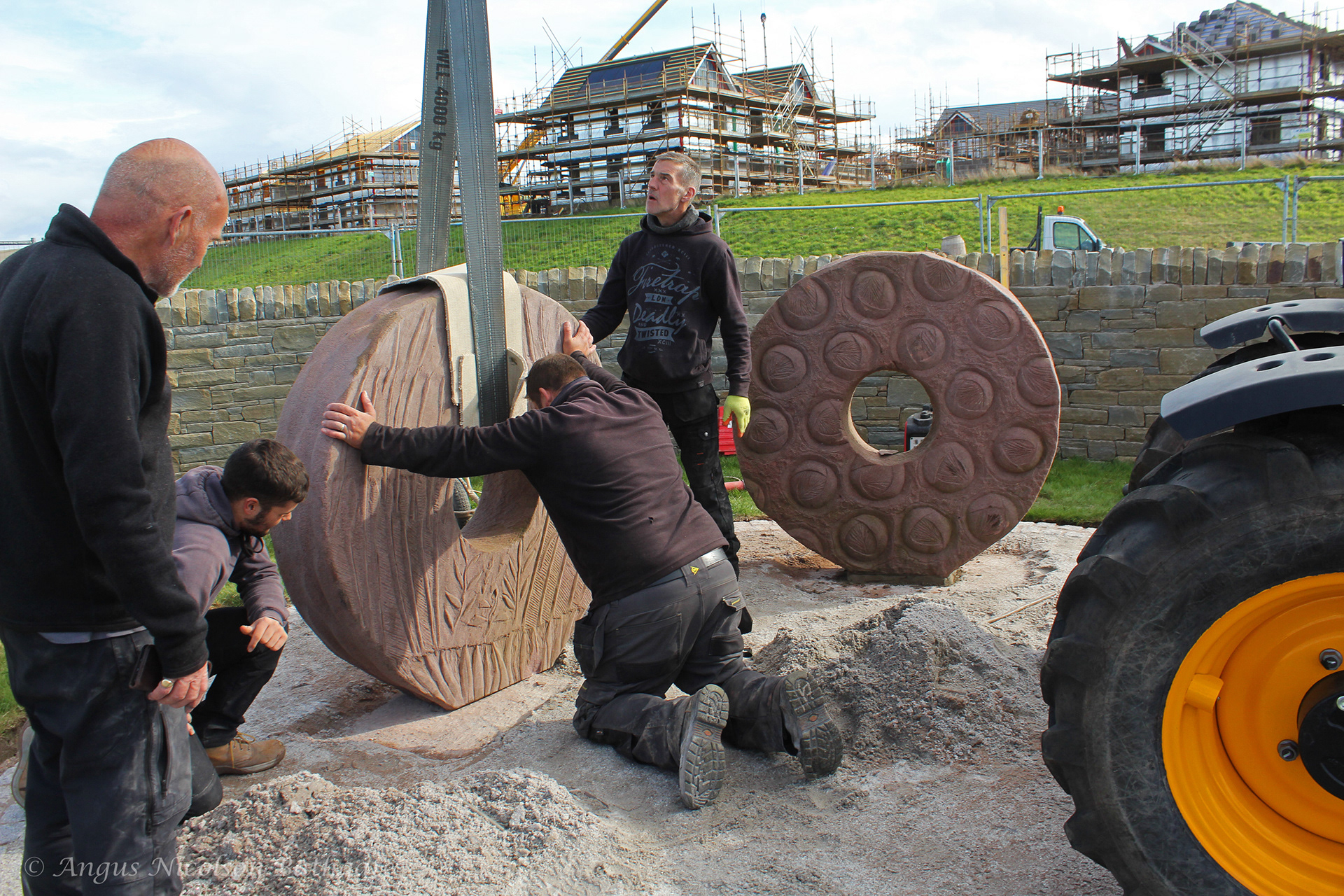 Installing the St Clements Wells sculptures, Wallyford