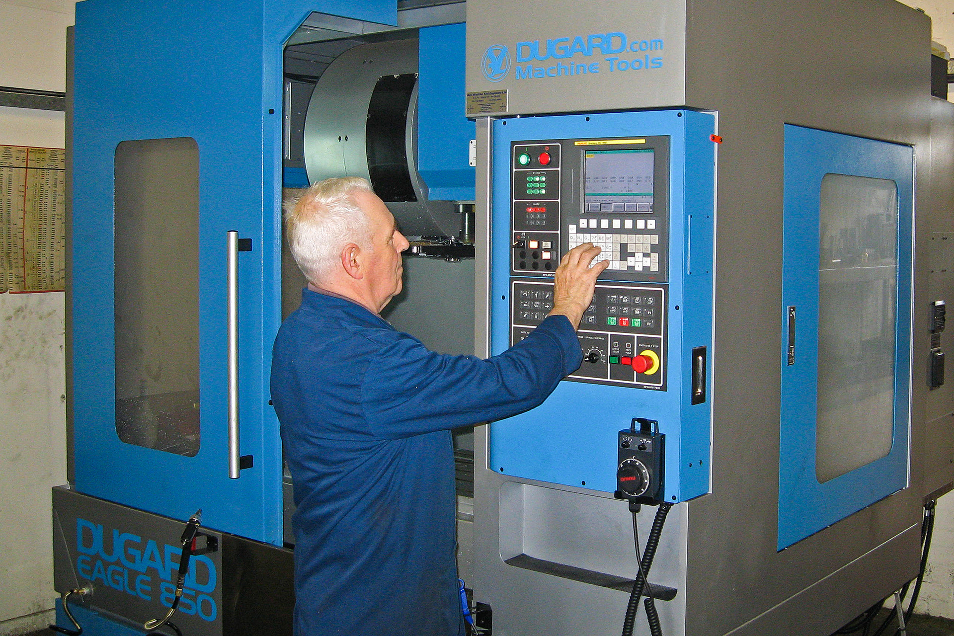Angus using a computerised machining centre