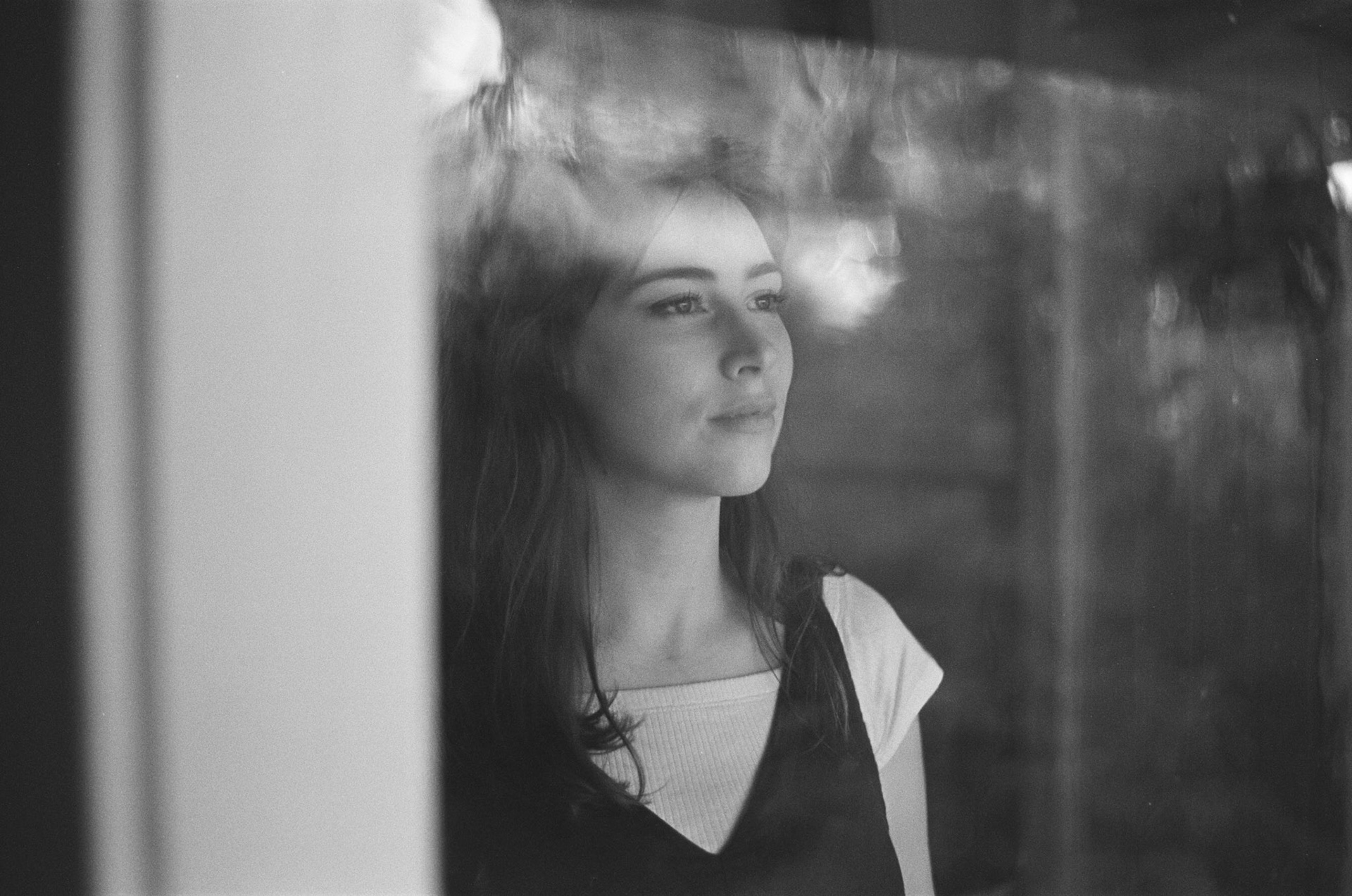 Nicola through her rear window [I]