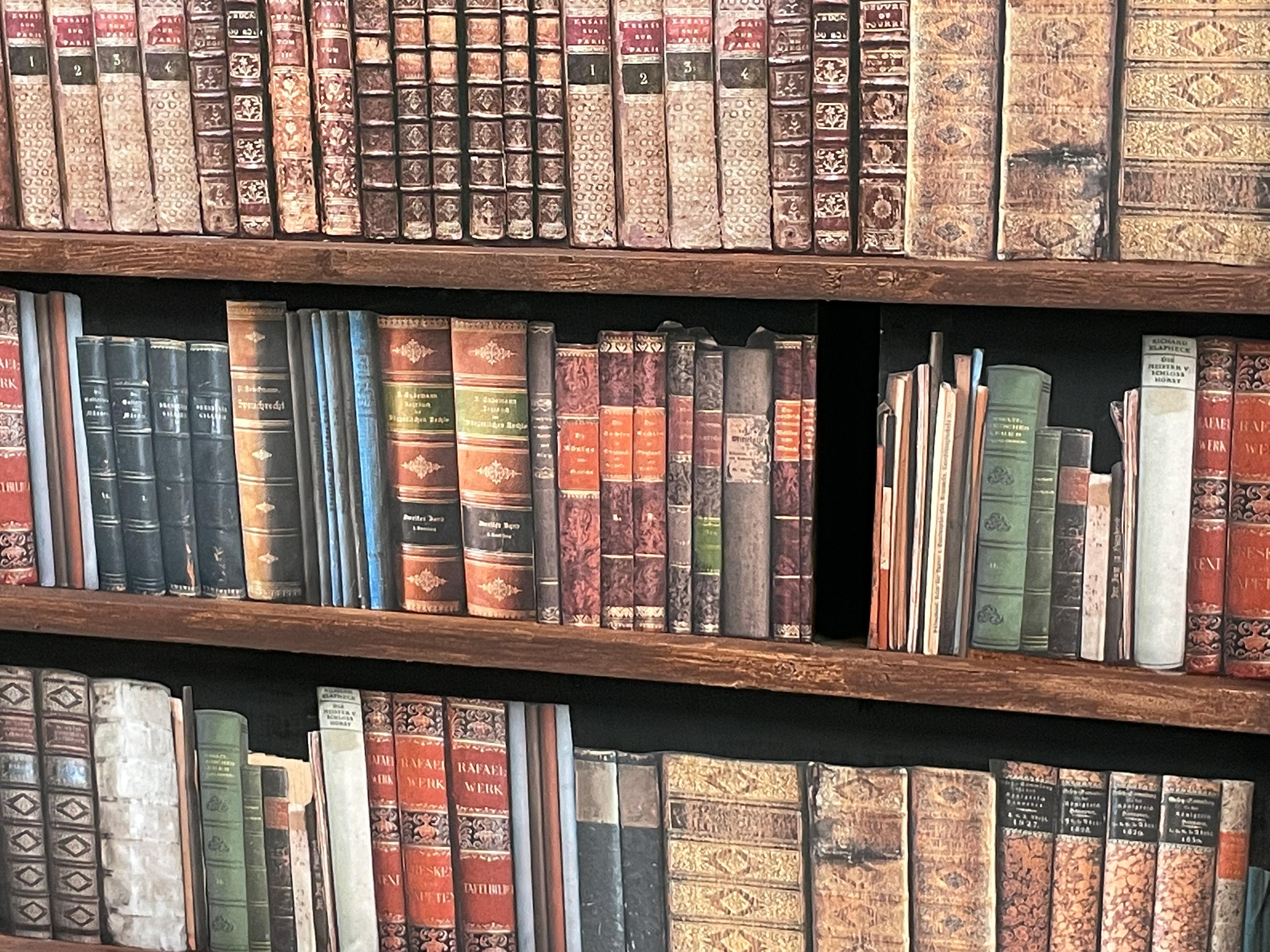 Wall Paper glueing the Printed Book Pieces