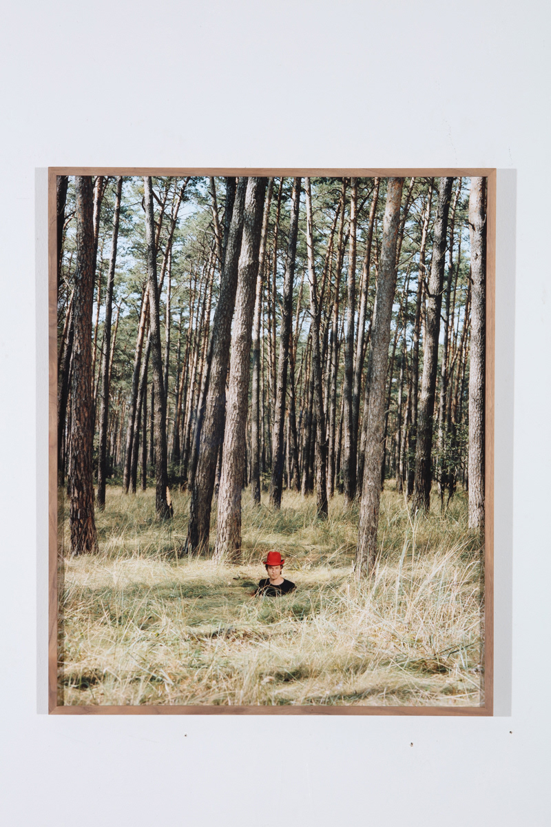€1250. Exhibition Print. The man with the red hat. 50x70 analogue c-print in Profilex frame