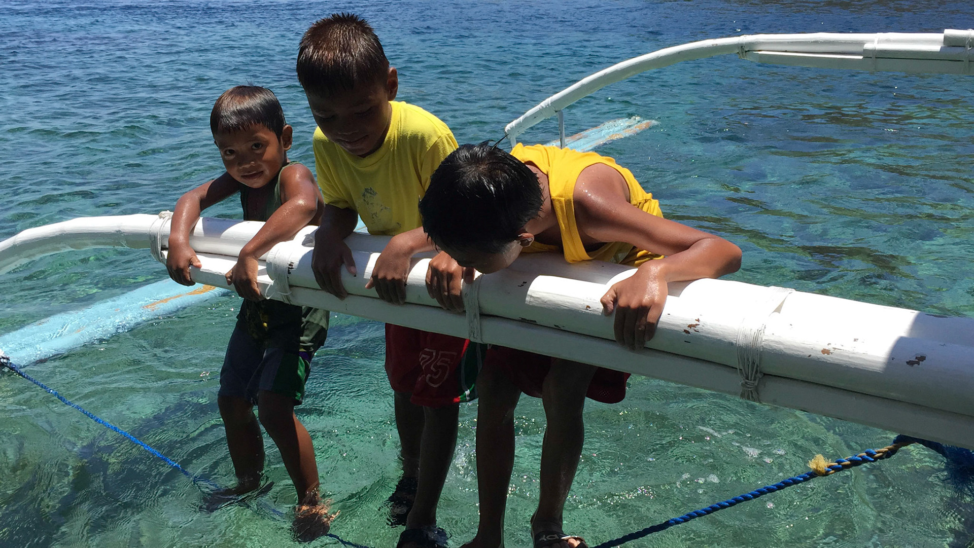 Filipino children playing on our boat