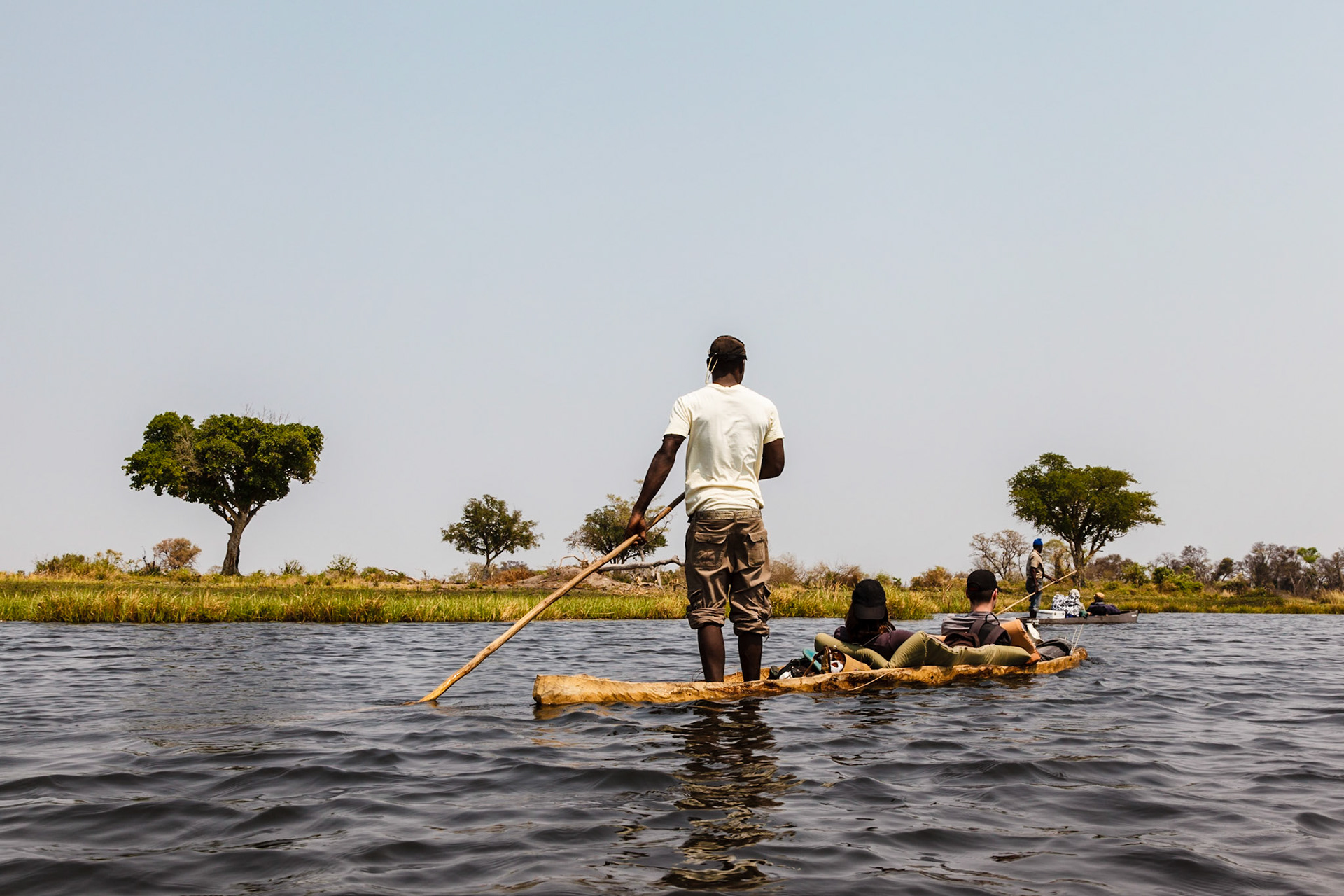 Poling mokoros through the Okavango Delta