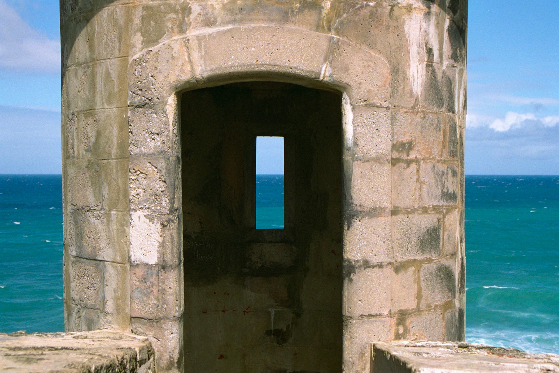 The El Morro fortress in San Juan, Puerto Rico. What I especially liked here was the different shades of blue in the little window from the sky, deep water, and shallow water.