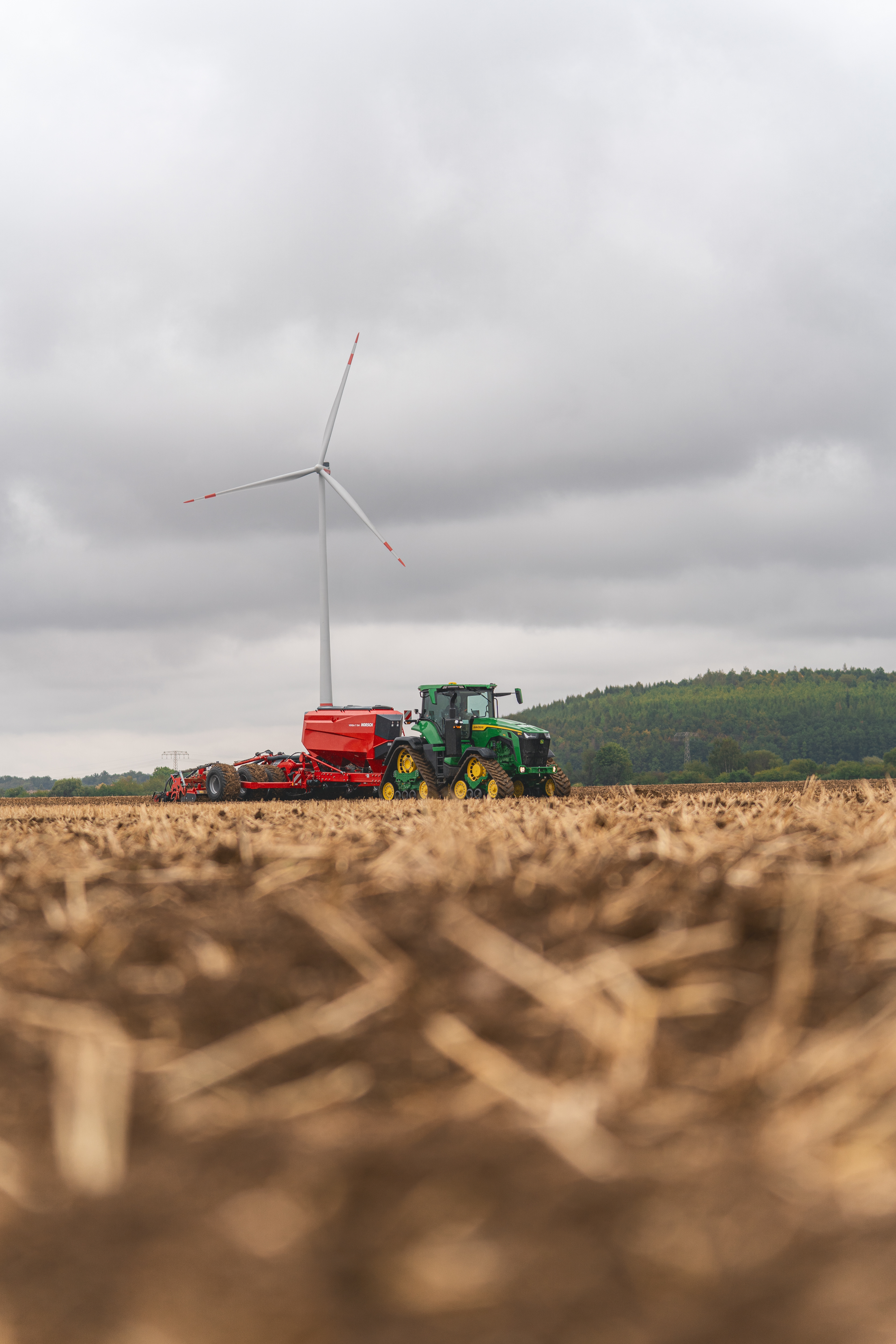 John Deere 8RX mit Horsch Versa 7