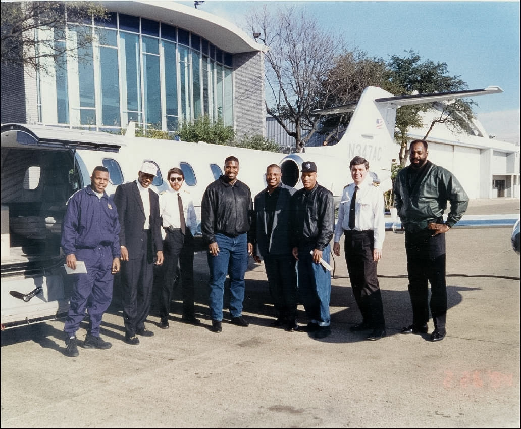 The Dallas Cowboy football team with Capt. Daley