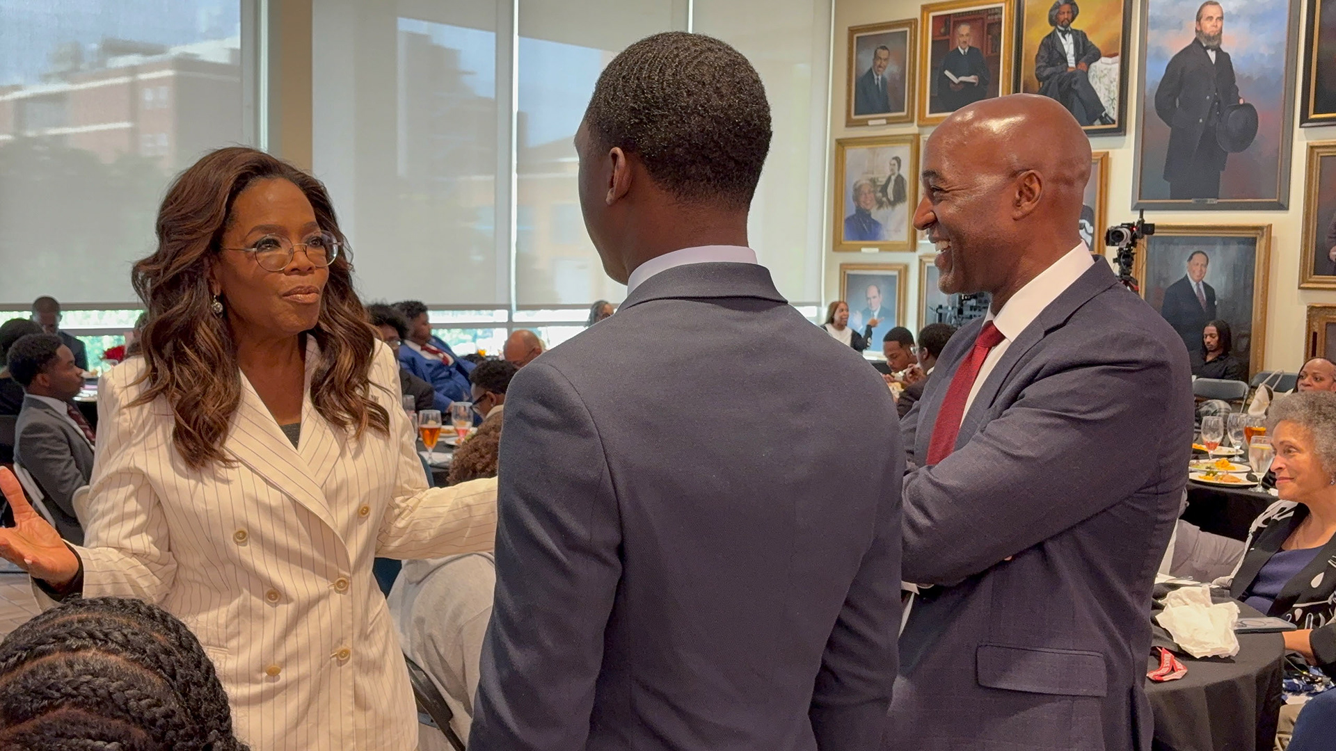 LIVING LEGEND Chris converses with Oprah Winfrey and President Bowman at the annual Oprah Winfrey Scholars Gala. (Photo/Noah Cathey)