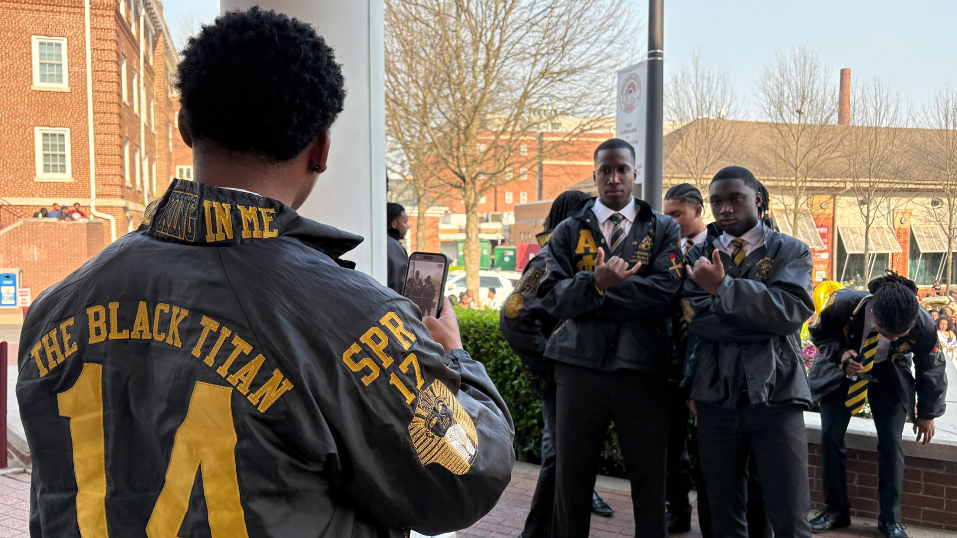 LONG LIVE THE T Chris and line brother Jared Myers pose in their line jackets at the 2026 Miss Black and Gold reveal for the Alpha Rho chapter. (Photo/Noah Cathey)
