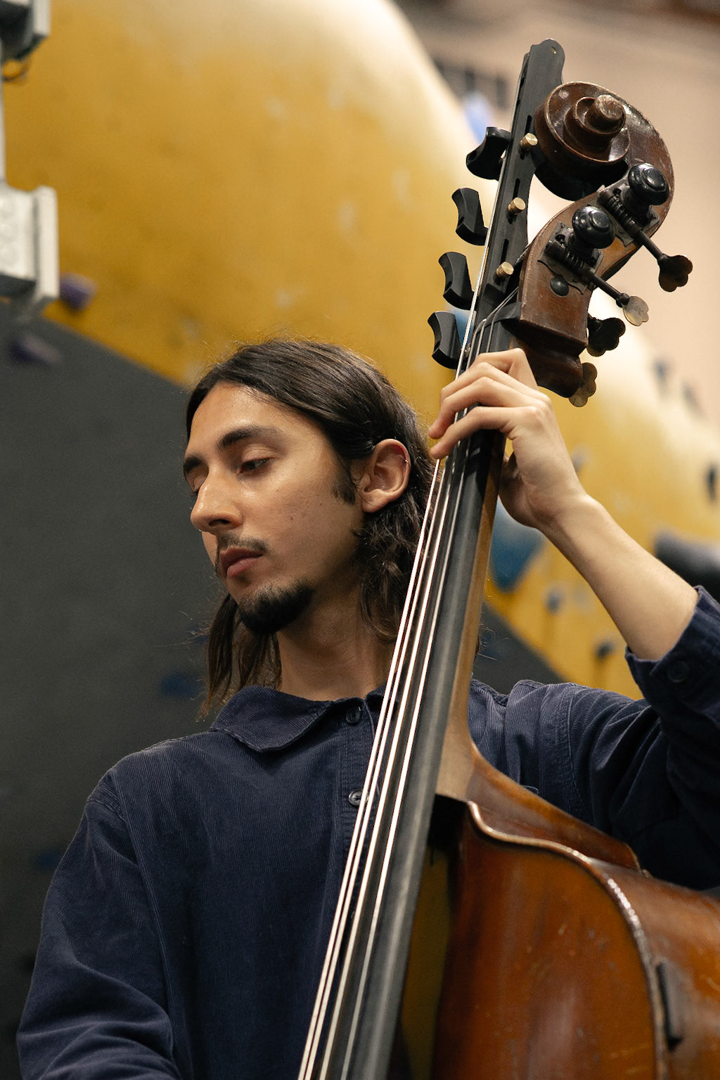 Dario Bizio playing on the double bass. Photographed by Francisco Santiago on 2025.05.28 at LA Boulders in Los Angeles, CA. Shot using a Sony A7III.