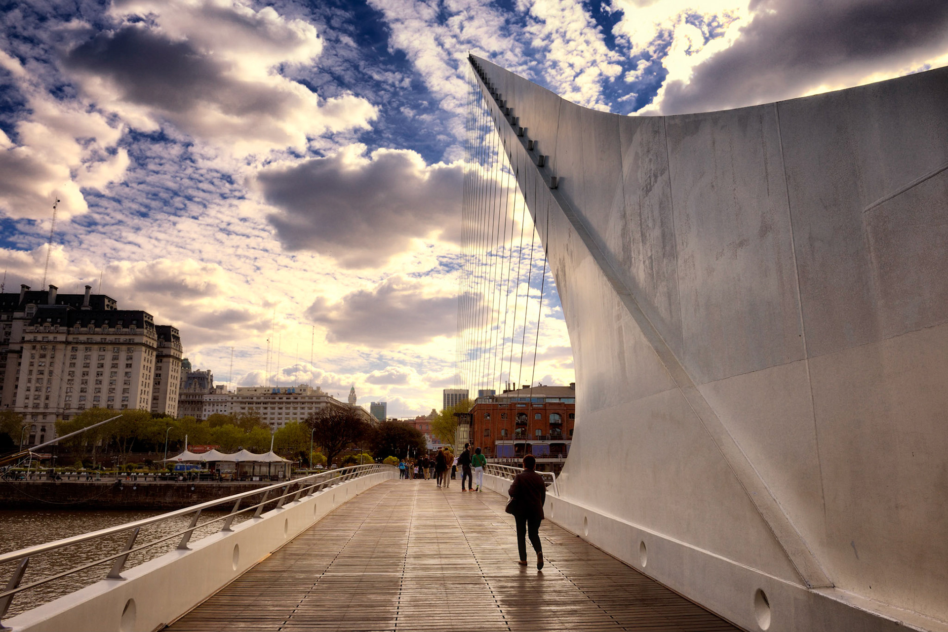 Crossing the Puente de la Mujer bridge