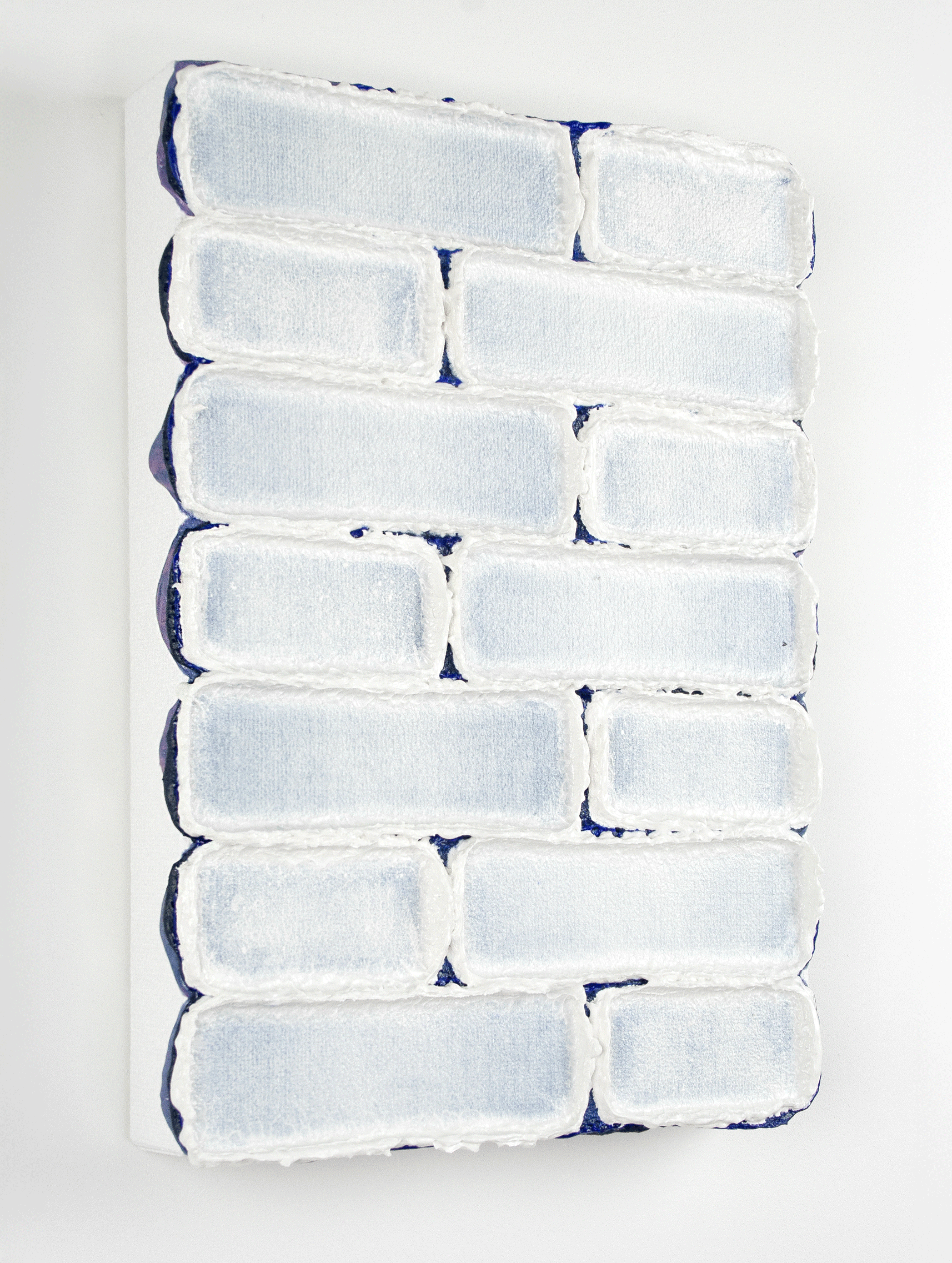 A striking abstract painting by contemporary Dutch artist Maurice van Venrooij, depicting a grid-like pattern of soft blue rectangular shapes with thick white textured borders against a deep navy background. The painting’s tactile surface and structured composition reflect Van Venrooij’s signature abstract style.