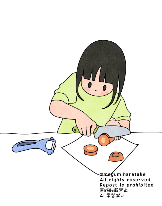にんじんを切るこども