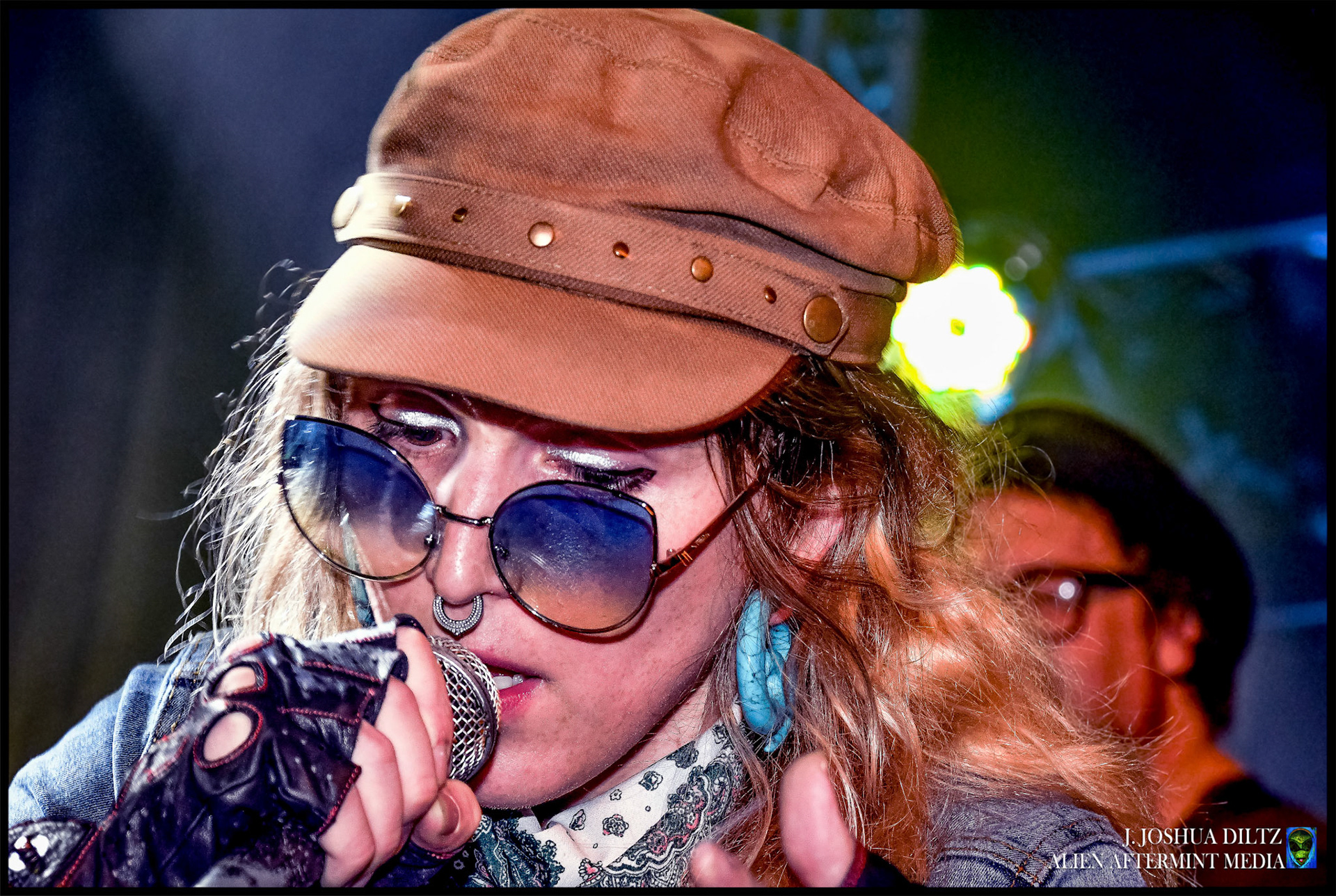 A vocalist unleashes her talent on stage at Mo' Jam Presents :  Mo' Jam Mondays, a weekly gathering of Seattle artist featuring an improvisational jam with the regions hottest talent.  [Seattle, Washington  October 2018]  Photo by J. Joshua Diltz, Alien Aftermint