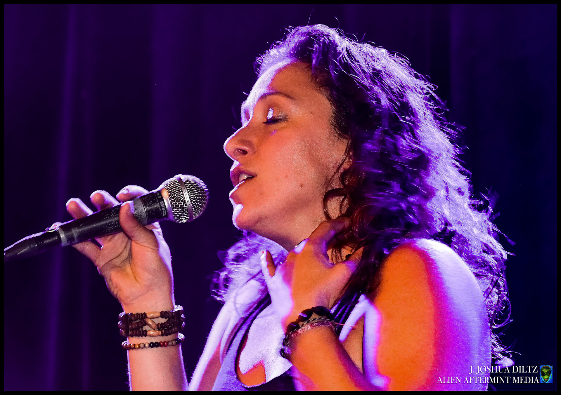 Vocalist LIndsey Caron brings her talent and enthusiam to the spotlight at Mo' Jam Presents :  Mo' Jam Mondays, a weekly gathering of Seattle artist featuring an improvisational jam with the regions hottest talent.  [Seattle, Washington October 2018] Photo by J. Joshua Diltz, Alien Aftermint