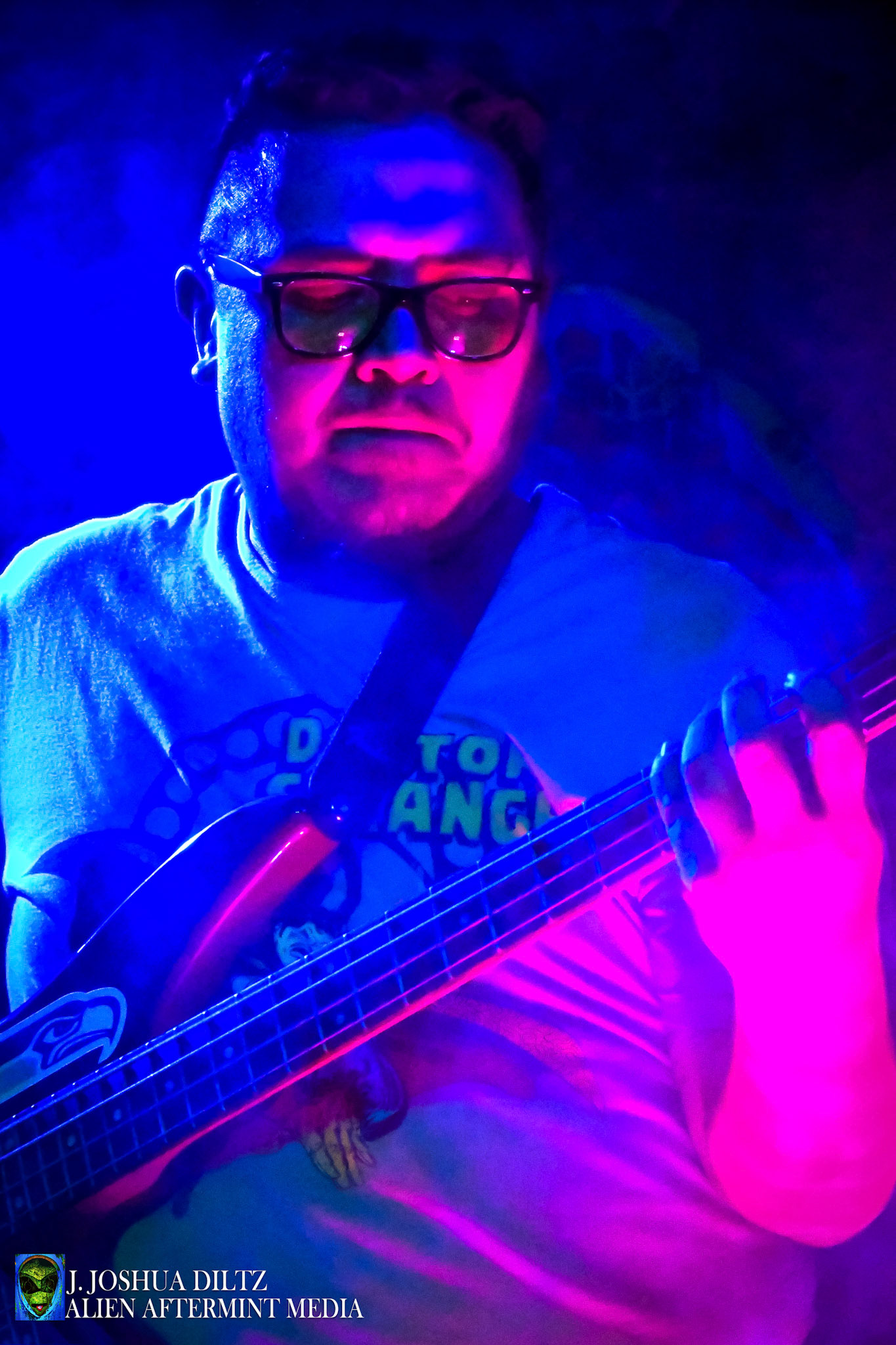 Percussionist and Mo' Jam Presents Executive Director picks up bass to the lead the way for youth music at Sea Mo' Saturdays at the Sea Monster Lounge.  [Seattle  January 2017]  J Joshua Diltz, Alien Aftermint