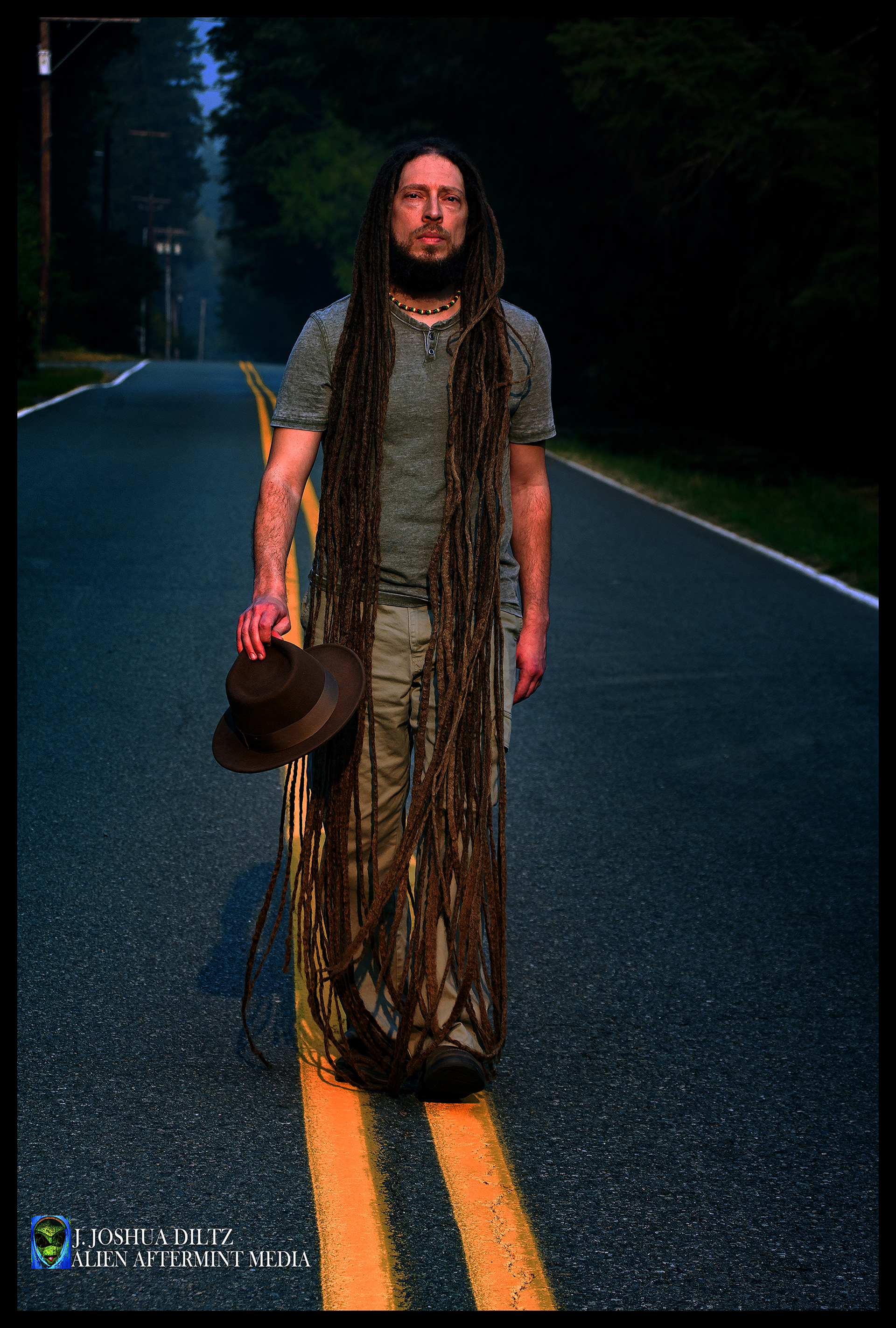 Singer/Songwriter Jay Canter of the reggae band Street Level Uprising Strolls Beneath the a smoke smothered sun while visiting the Pacific Northwest.  Photo by J. Joshua Diltz.  Alien Aftermint.